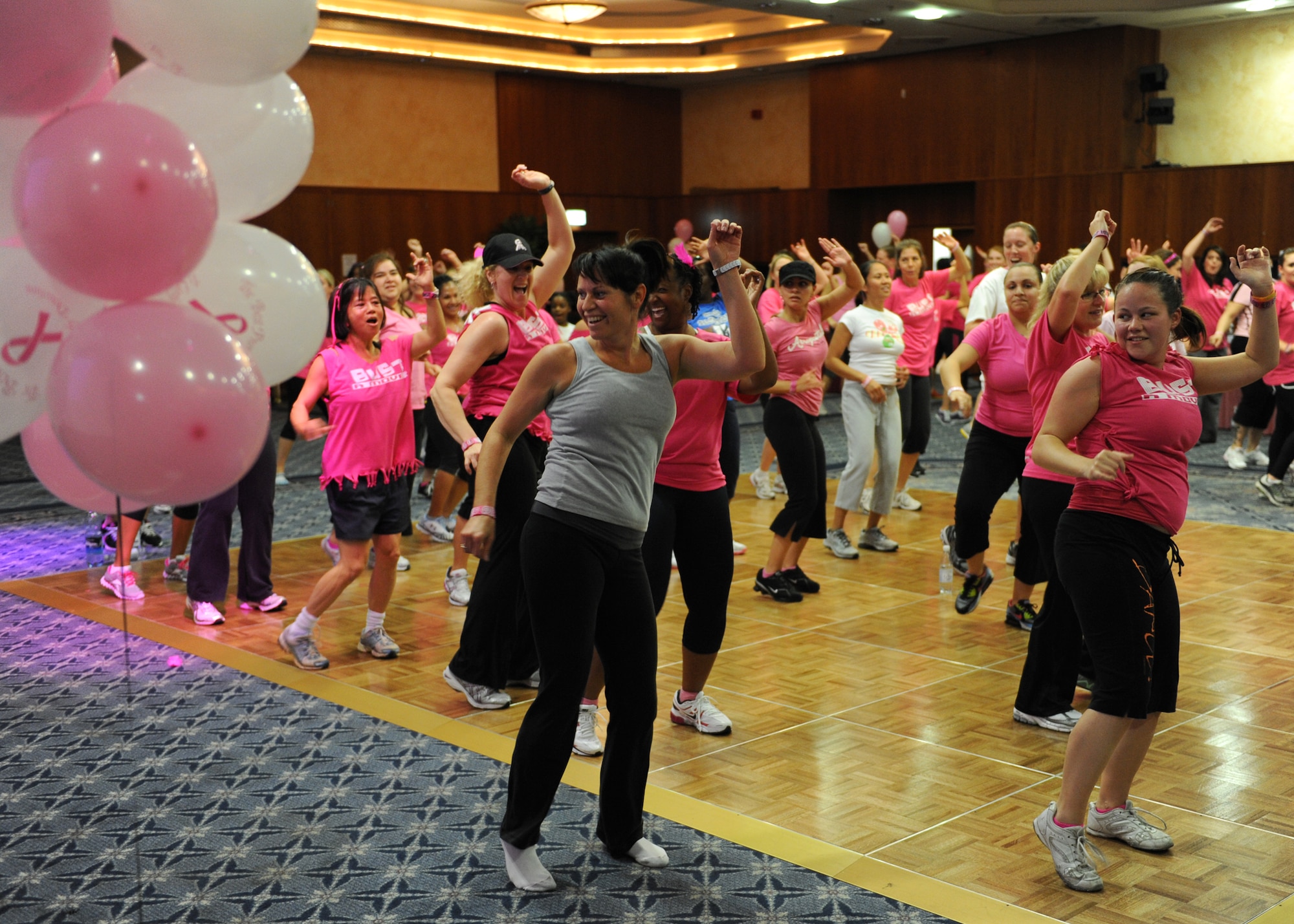 SPANGDAHLEM AIR BASE, Germany – More than 130 participants dance during the Zumba for a Cure event in support of Breast Cancer Awareness Month here Oct. 13. Zumba for a Cure raised more than $2,000 toward the Susan G. Komen Foundation for Breast Cancer Research. (U.S. Air Force photo/Senior Airman Christopher Toon)
