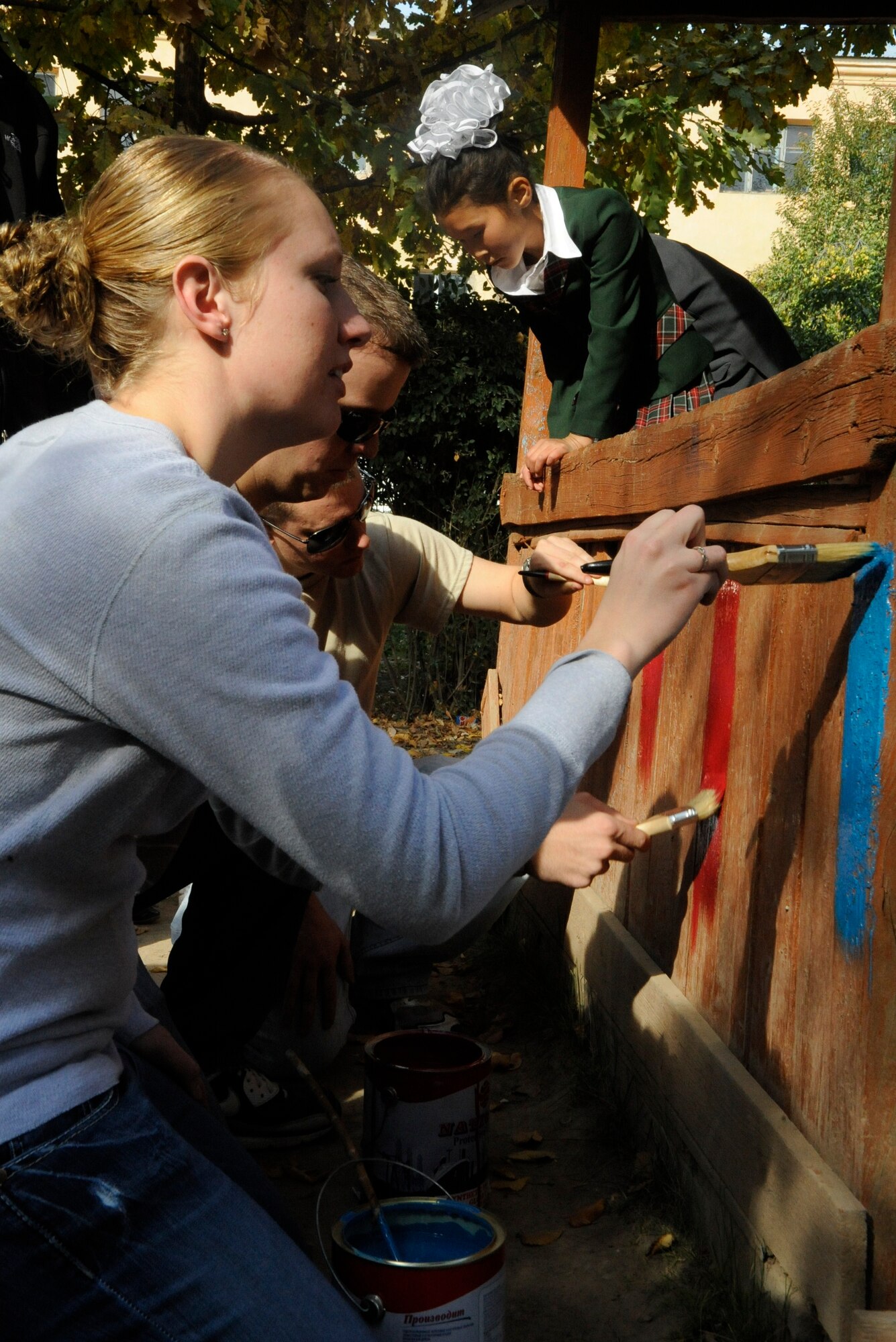 Staff Sgt. Tina Talamantes paints a gazebo at the Nizhanchuisk Orphanage and School, Kyrgyzstan, Oct. 13. Talamantes was one of six Manas Area Benefit Outreach Society Airmen who visited the orphanage to paint, deliver donations and play with the children. Talamantes is a 376th Expeditionary Security Forces Squadron patrolman and is the MABOS Nizhanchuisk Orphanage alternate focus group leader. She is deployed to the Transit Center at Manas from MacDill Air Force Base, Fla. She is a native of Steeleville, Ill. (U.S. Air Force photo/Tech. Sgt. Tammie Moore)