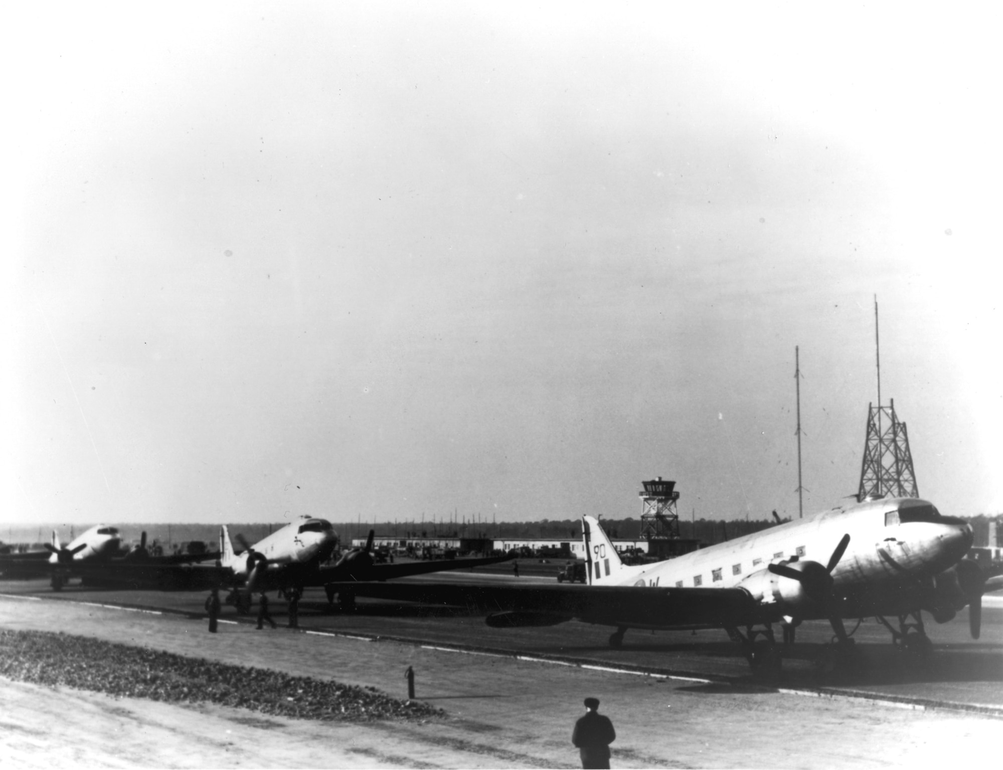 Royal Air Force C-47s being unloaded in the beginning days of flight operations at Tegel. (U.S. Air Force photo)
