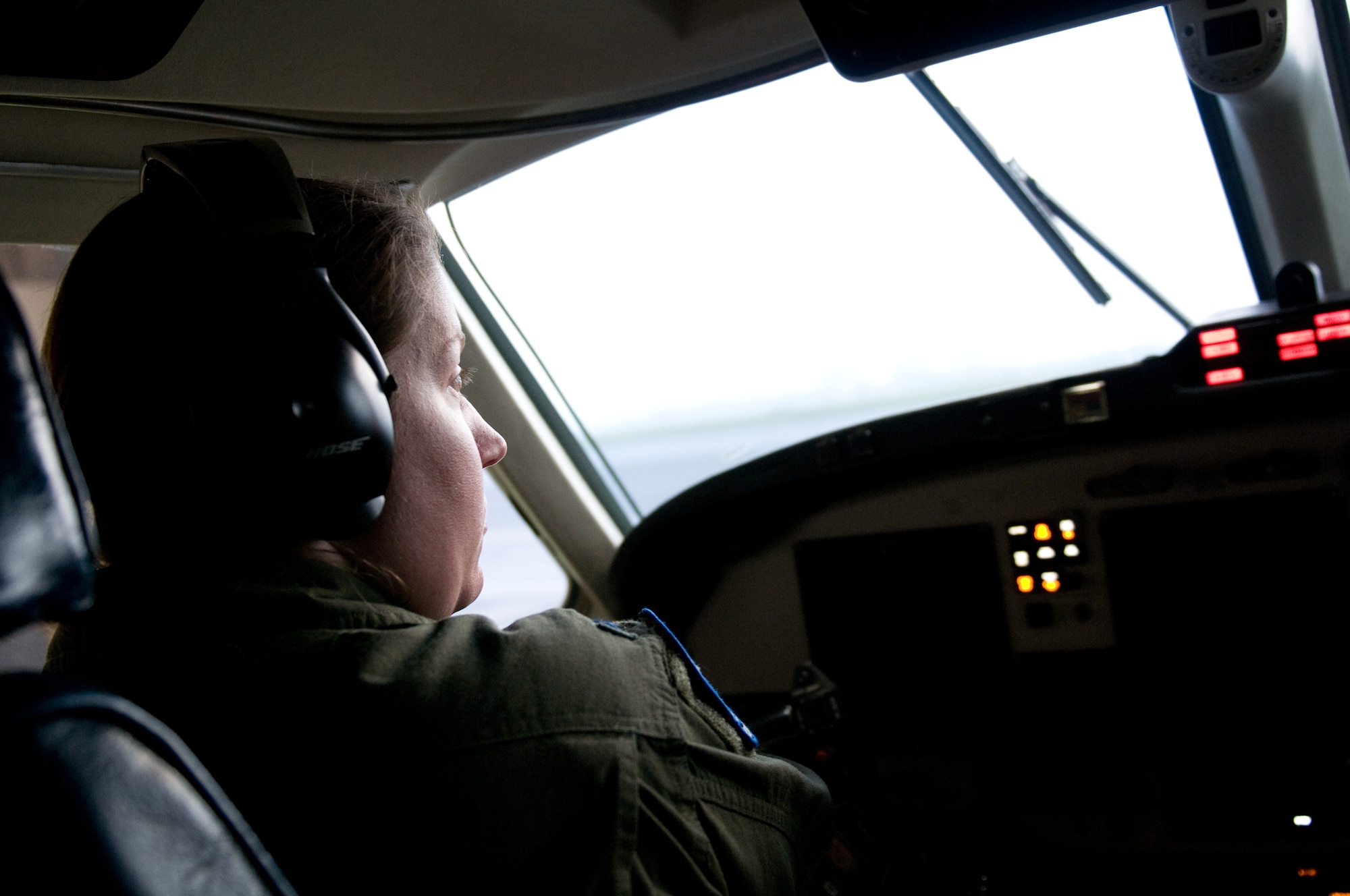 YOKOTA AIR BASE, Japan -- 1st Lt. Melissa Hughes, 459th Airlift Squadron C-12 Huron pilot, prepares for a flight at Yokota Air Base, Japan, Oct. 14, 2011. The 459th AS is one of the few airlift squadrons in the Air Force with both rotary and fixed wing aircraft. (U.S. Air Force photo/Airman 1st Class Krystal M. Garrett) 