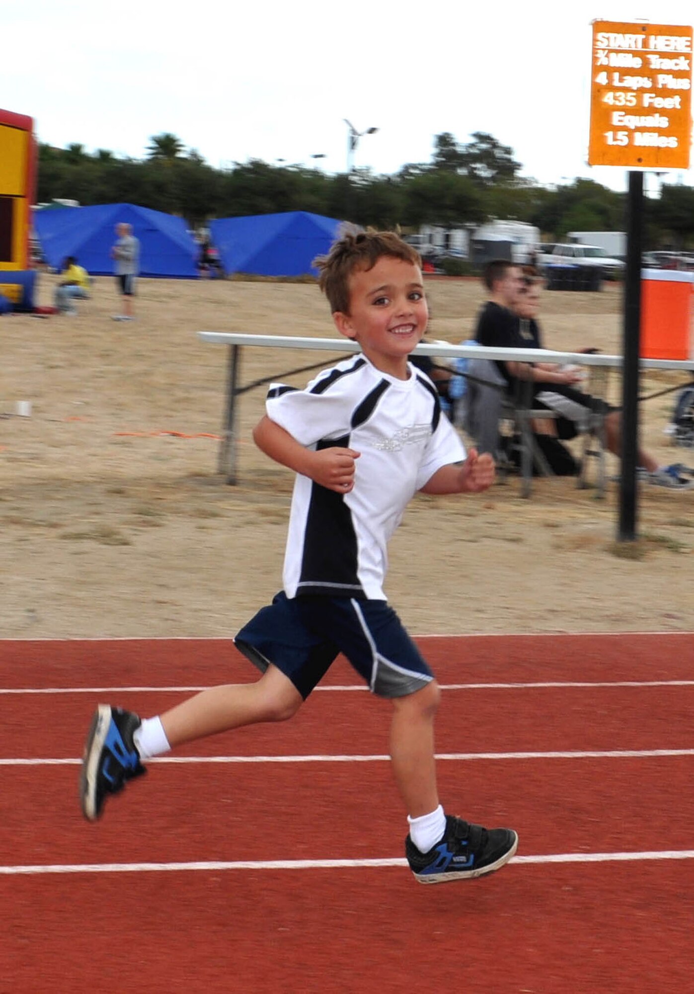 TRAVIS AIR FORCE BASE, Calif. -- Five year old Jack Flournoy runs in the Oct. 1 Viking Challenge 12-hour relay. Jack completed just over 10 miles to help raise money for the Travis Fisher House. Located next to David Grant USAF Medical Center, it is a place of quiet respite for the families of Soldiers, Sailors, Airmen, Marines and Coast Guardsmen receiving medical treatment. It is a full service facility (rooms, kitchen, laundry, etc.) designed to accommodate up to seven families or 16 people at a time. (U.S. Air Force photo/Senior Master Sgt. Ellen L. Hatfield)