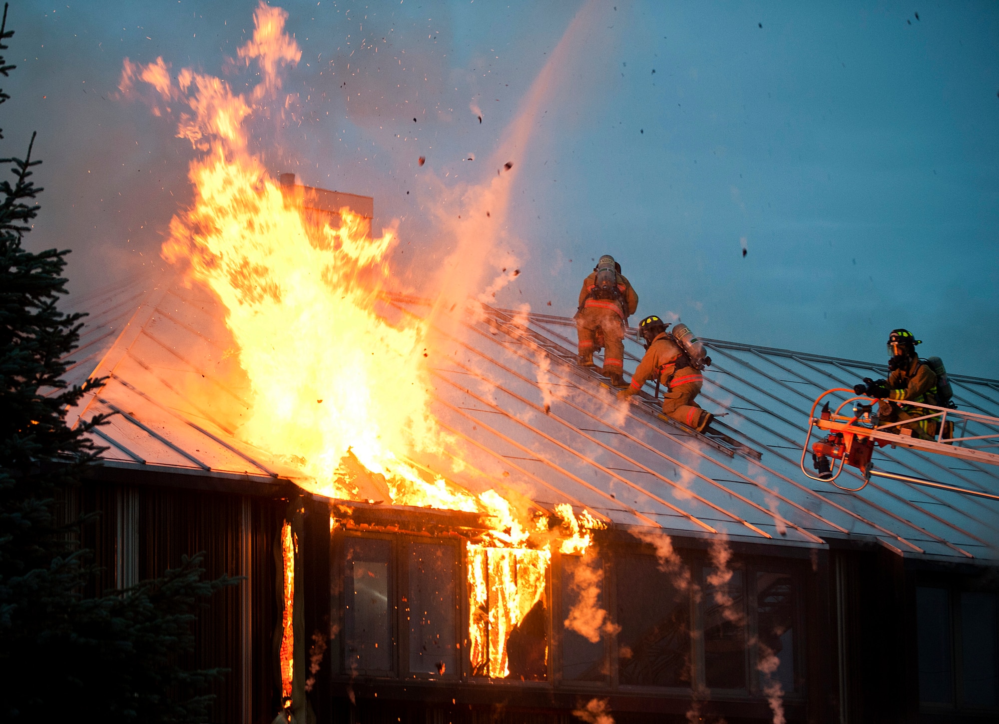 Firefighters battle a fire Oct. 13, 2011, at the lodging facility at Joint Base Elmendorf-Richardson, Alaska. All occupants were accounted for and no injuries were reported. (U.S. Air Force photo/Staff Sgt. Zachary Wolf)   