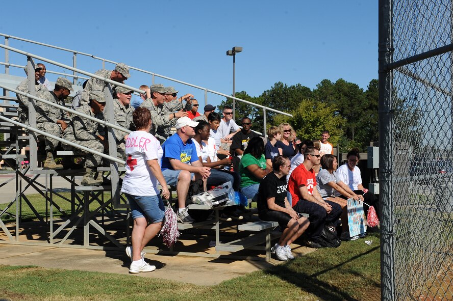 Members of Team Moody show support at the Chief vs. Eagles Softball game during Super Sports Day at Moody Air Force Base, Ga., Oct. 17, 2011. Airmen, civilian employees and dependents over 18 years old were able to participate in Super Sports Day and show off their athletic skills. (U.S. Air Force photo by Senior Airman Ciara Wymbs/Released) 