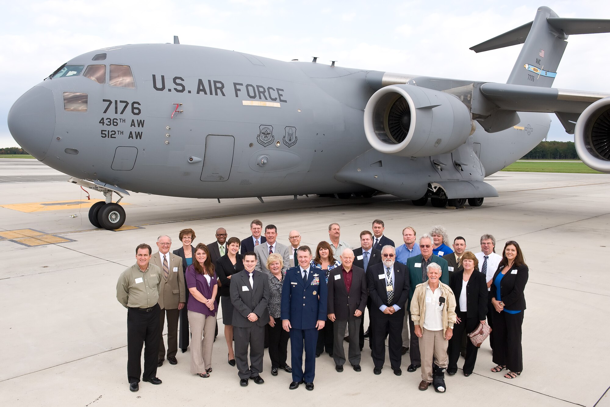 Col. Cal Mercer, vice commander of the 436th Airlift Wing, stands with members from the Central Delaware Chamber of Commerce, who attended a military-construction briefing Oct. 17, 2011, at Dover Air Force Base, Del. The group was briefed on completed, current and future construction projects at Dover AFB. (U.S. Air Force photo by Roland Balik)