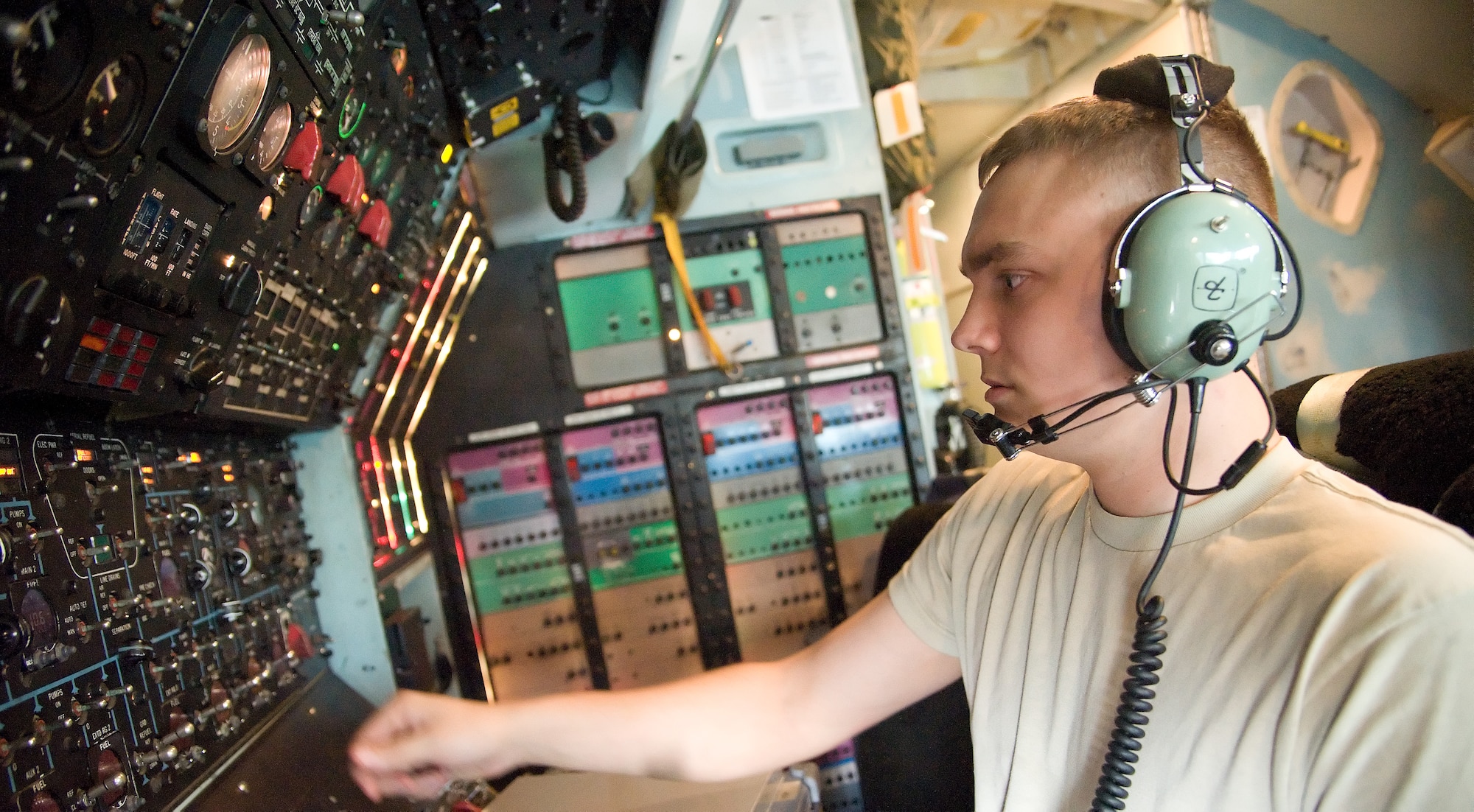 Airman 1st Class Joshua Norkevitz, a crew chief with the 436th Aircraft Maintenance Squadron, conducts a pre-flight test on a C-5 Galaxy Oct. 14, 2011, at Dover Air Force Base, Del. Seven C-5s took off between Oct. 14 and Oct. 20 as part of a United States Transportation Command-wide 41-plane C-5 surge. (U.S. Air Force photo by Adrian Rowan)