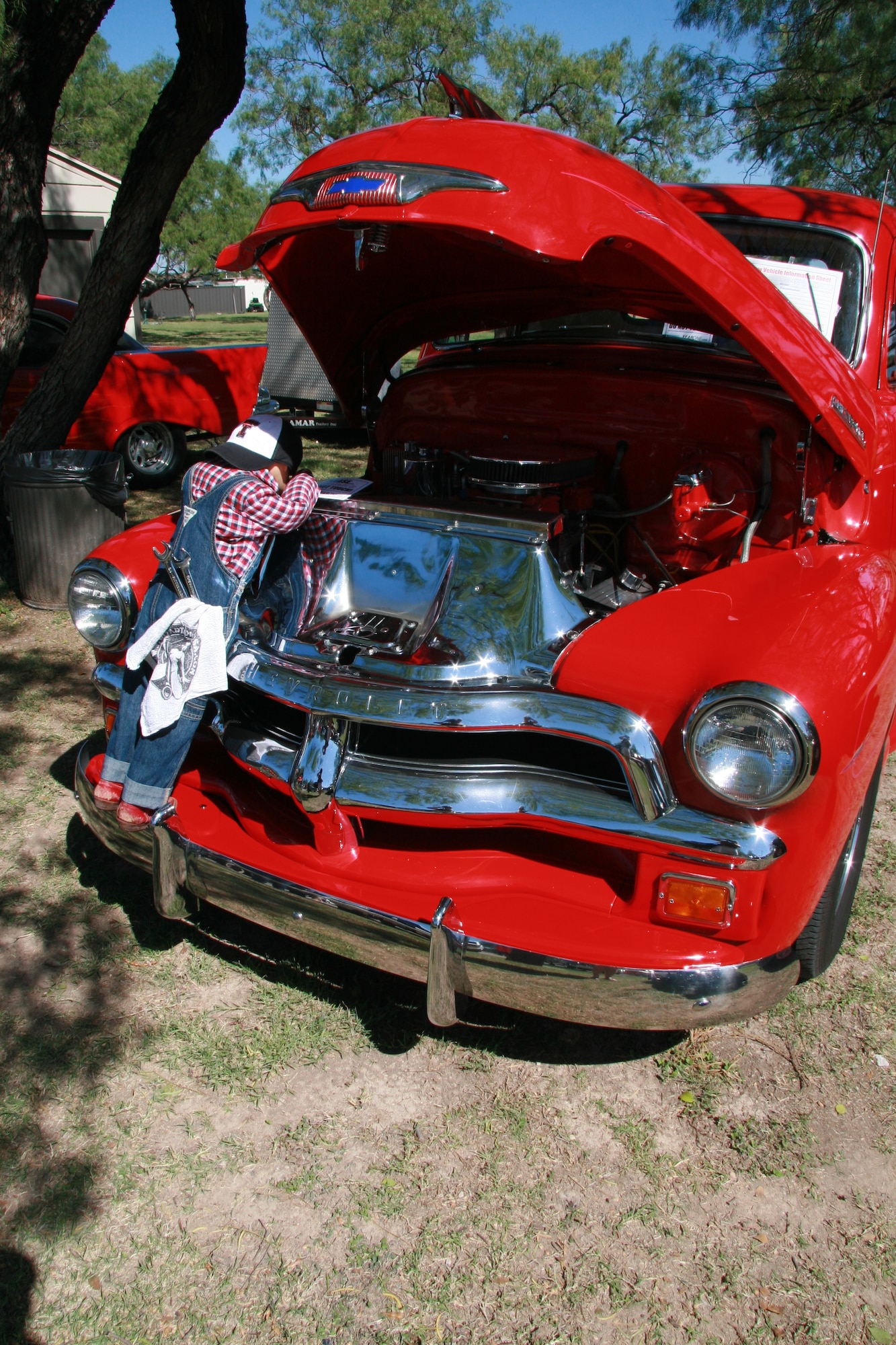 GOODFELLOW AIR FORCE BASE, Texas—A classic 1950s Chevrolet truck with a life sized-doll sits on display at the Goodfellow Car Show Oct. 15 at the Recreation Camp. More than 1,500 San Angelo community members and Team Goodfellow personnel viewed 120 vehicles including motorcycles, corvettes and classic cars during the 13th annual event. (U.S. Air Force photo/ Julie Manuel)