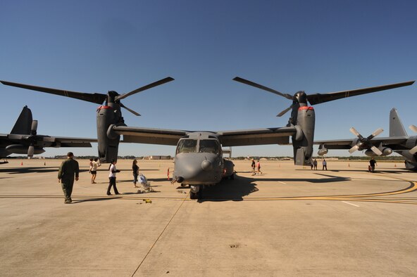 Fall Festival attendees look at a CV-22 Osprey static at the Freedom Hangar, Hurlburt Field, Fla., Oct. 15, 2011. The static displays gave the public a close-up view of operational aircraft. (U.S. Air Force photo/Senior Airman Eboni Reams)