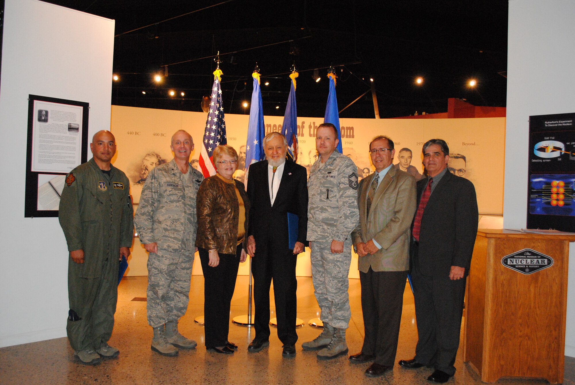 The commander of the Air Force Nuclear Weapons Center inducted the inaugural "Order of the Nucleus" recipients Sept. 29 at the National Museum of Nuclear Science and History in Albuquerque. Picture are, from left, Col. Joe Martinez, Brig. Gen. Garrett Harencak, Ronnie Mather, Leon Smith, Senior Master Sgt. Daniel Willand, Michael Martinez and Harold Camacho. Not pictured are Brig. Gen. John Thompson and Brig. Gen. Everett Thomas.