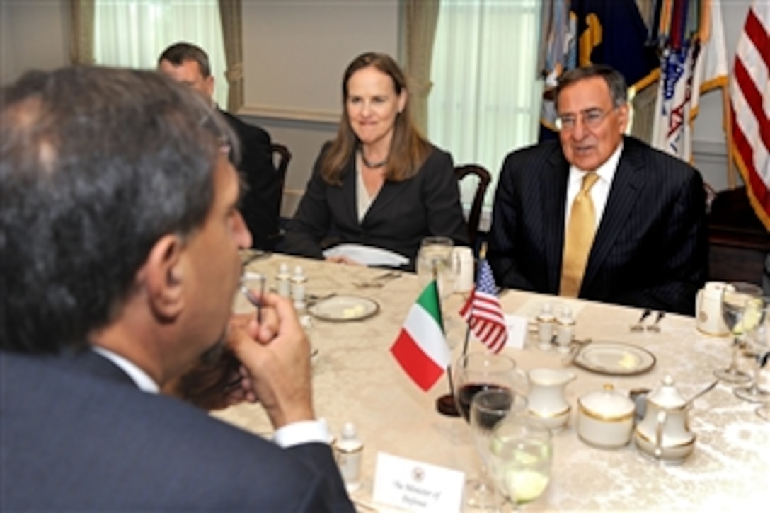 Secretary of Defense Leon E. Panetta, right, talks to Italian Defense Minister Ignazio La Russa, foreground, during a working lunch in the Pentagon in Arlington, Va., on Oct. 17, 2011.  Among those joining Panetta on the U.S. side of the table is Under Secretary of Defense for Policy Michele Flournoy.  