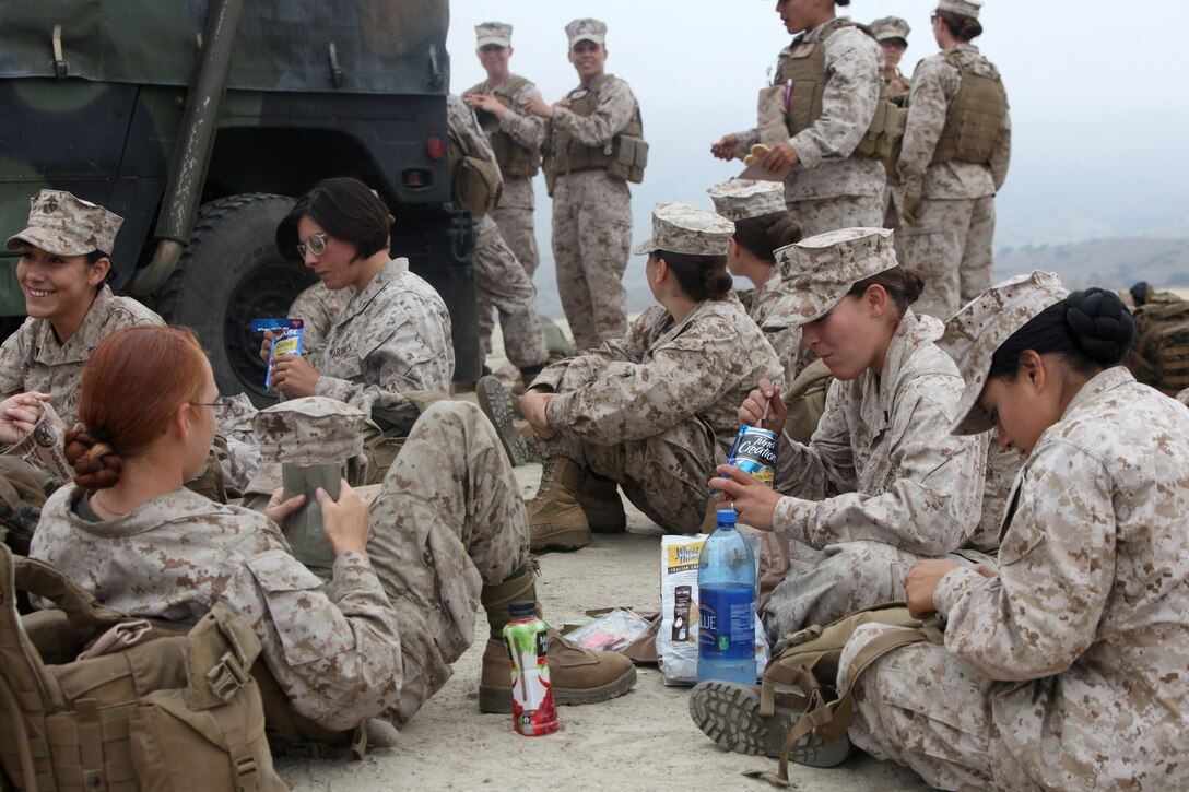 Marines with Female Engagement Team 12-1 take a break during training for an upcoming deployment to Afghanistan. The FET will undergo a variety of training evolutions including cultural awareness to help them accomplish their mission.