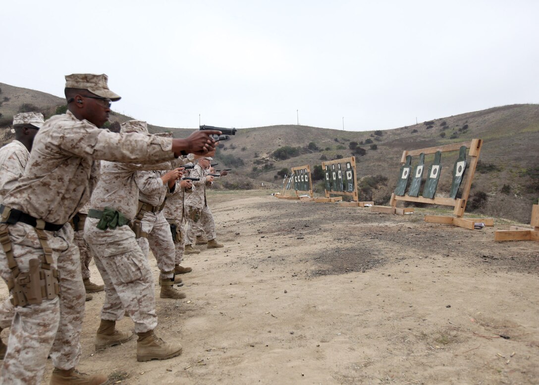 Sgt. Corey Williams, a 27-year-old motor transportation operator with Combat Logistics Battalion 5, Embedded Partner Team, prepares to fire his weapon on the range during a combat marksman program hosted by the I Marine Expeditionary Force Advisor Training Cell at Camp Pendleton Calif., Oct. 19.