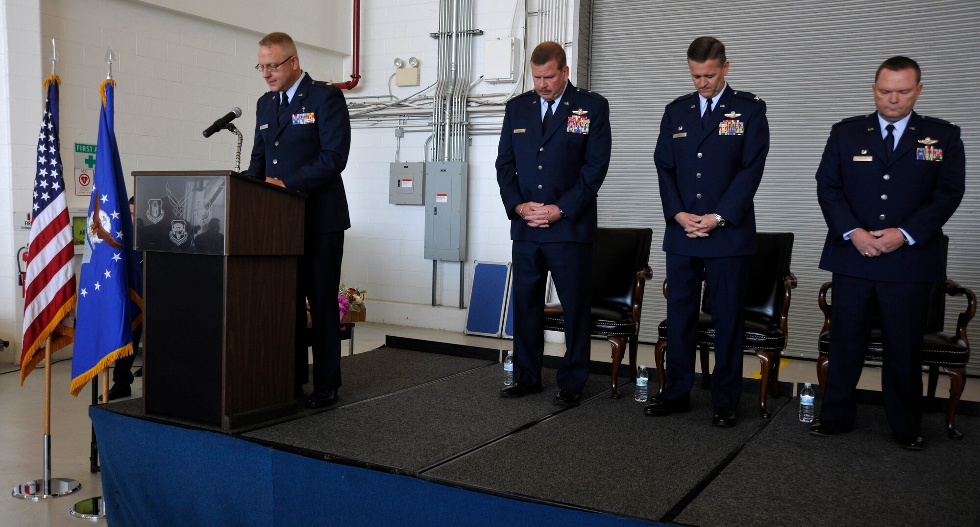 JOINT BASE ANDREWS, Md. -- Maj. William Wiecher, 459th Air Refueling Wing chaplain, provides the invocation during a change of command ceremony here Oct. 15. Leadership of the 459th ARW has been passed to Col. Samuel Mahaney, who comes to the wing from an operations group commander position at Westover Air Reserve Base, Mass. (U.S. Air Force photo/Airman First Class Lindsey Beadle)