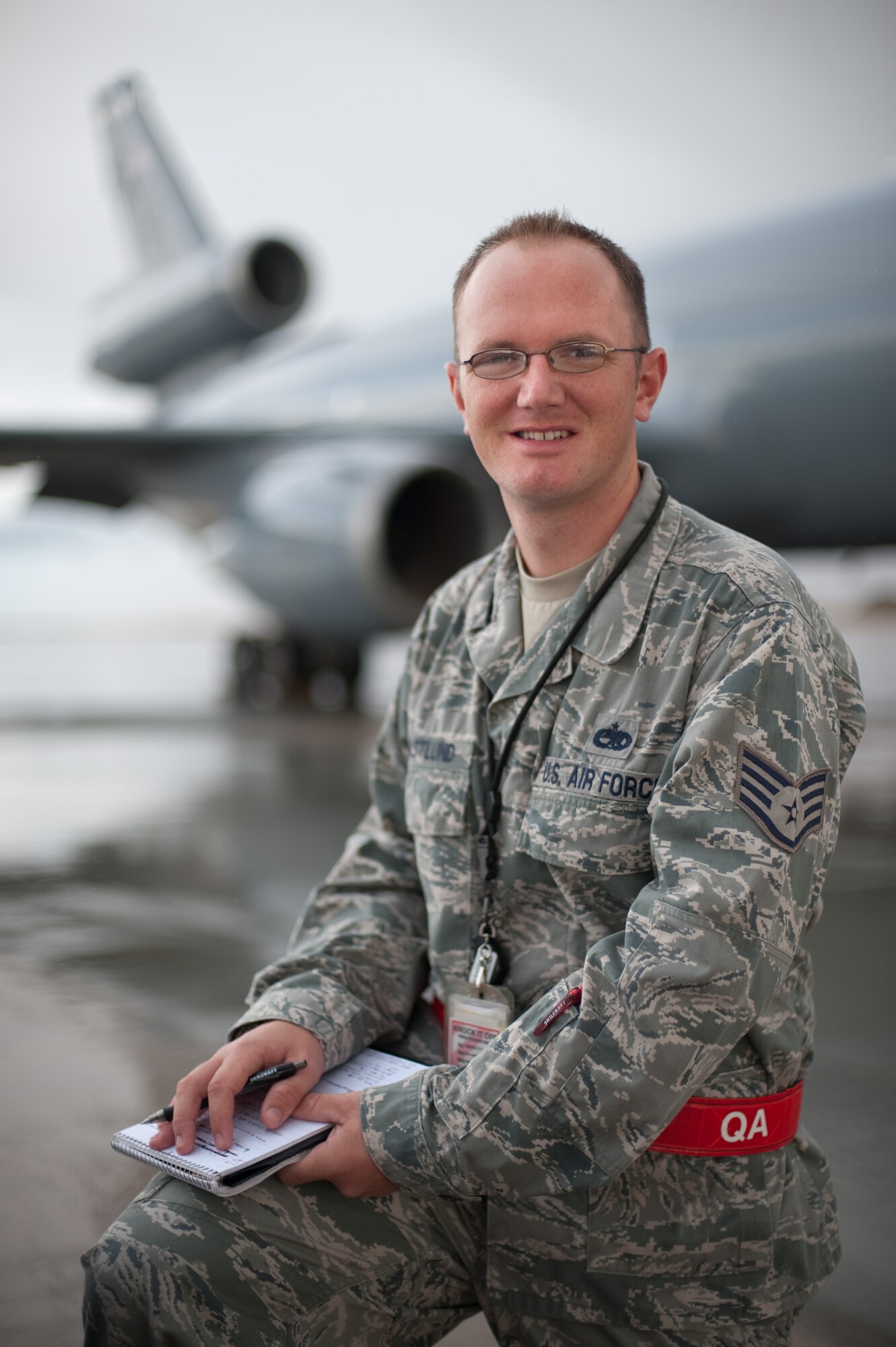 Rain or shine, Staff Sgt. Adam Eastlund, a quality assurance technician with the 60th Maintenance Squadron has worked on the Travis Air Force Base flightline for nearly eight years. (U.S. Air Force photo/ Ken Wright)
