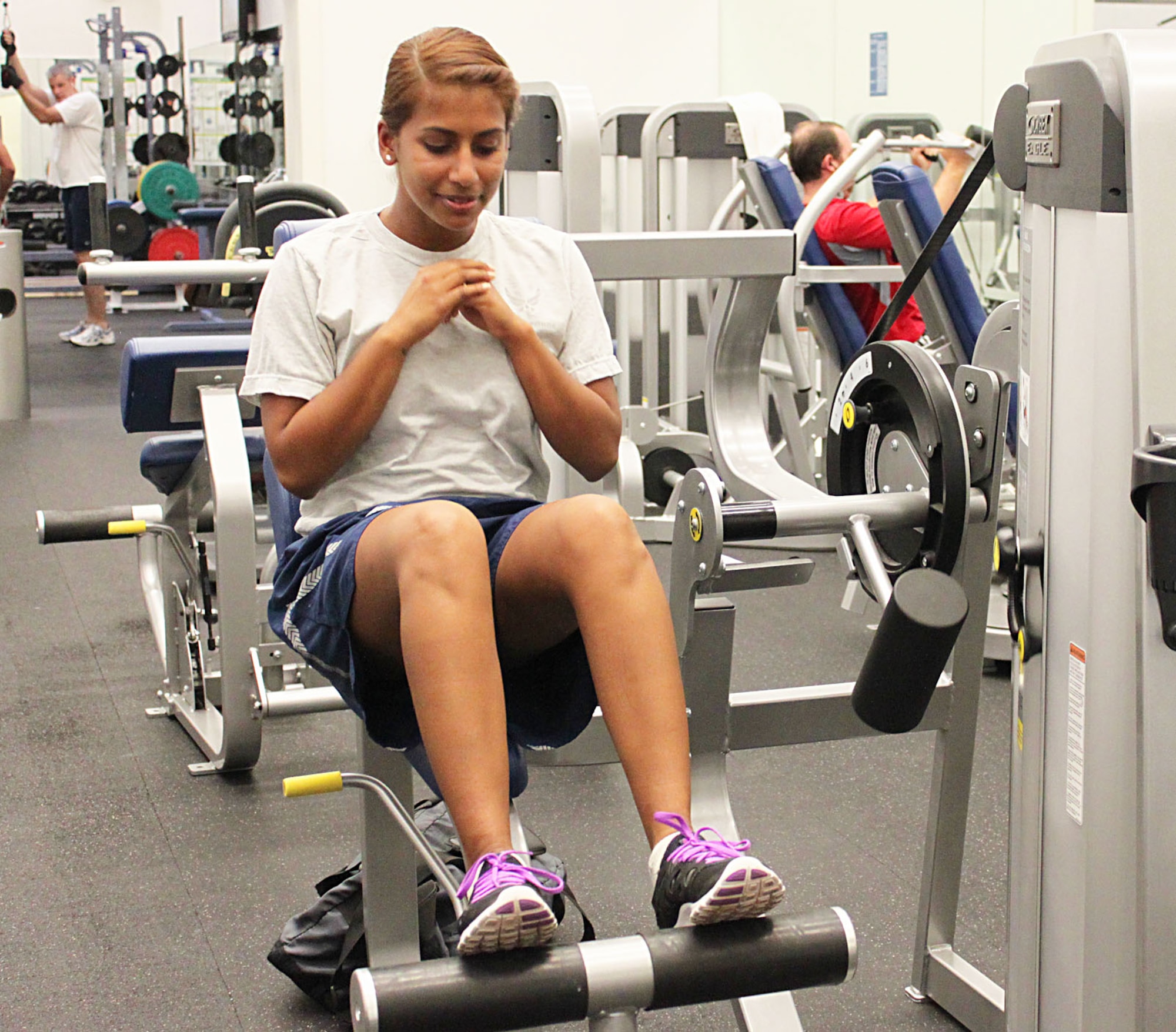 Airman 1st Class Natasha Whitten, 95th Medical Operations Squadron, uses the exercise equipment at the Fitness Center here. The fitness center offers a rubberized running track, indoor cardio room, and is currently undergoing renovations for even more improvements. The Fitness Center is located within the Airman's Campus, on W. Popson Ave., and is open Monday-Friday 5 a.m.-9p.m. and Saturdays 8 a.m.-4 p.m. For more information, contact Fitness Center Staff at 661-275-4961. (U.S. Air Force Photo by Meredith Mingledorff) 