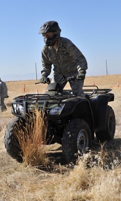 Col. Timothy Cook, 366th Medical Group commander, drives an ATV during a safety training course Oct. 14, 2011, at Mountain Home Air Force Base, Idaho. Cook was one of the six base senior leaders that received the training. (U.S. Air Force photo by Airman 1st Class Heather Hayward)