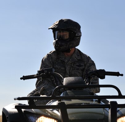 Col. Ron Buckley, 366th Fighter Wing commander, sits on an ATV while receiving training Oct. 14, 2011, at Mountain Home Air Force Base, Idaho. The ATVs are used to reach parts of the base that are otherwise inaccessible. (U.S. Air Force photo by Airman 1st Class Heather Hayward)