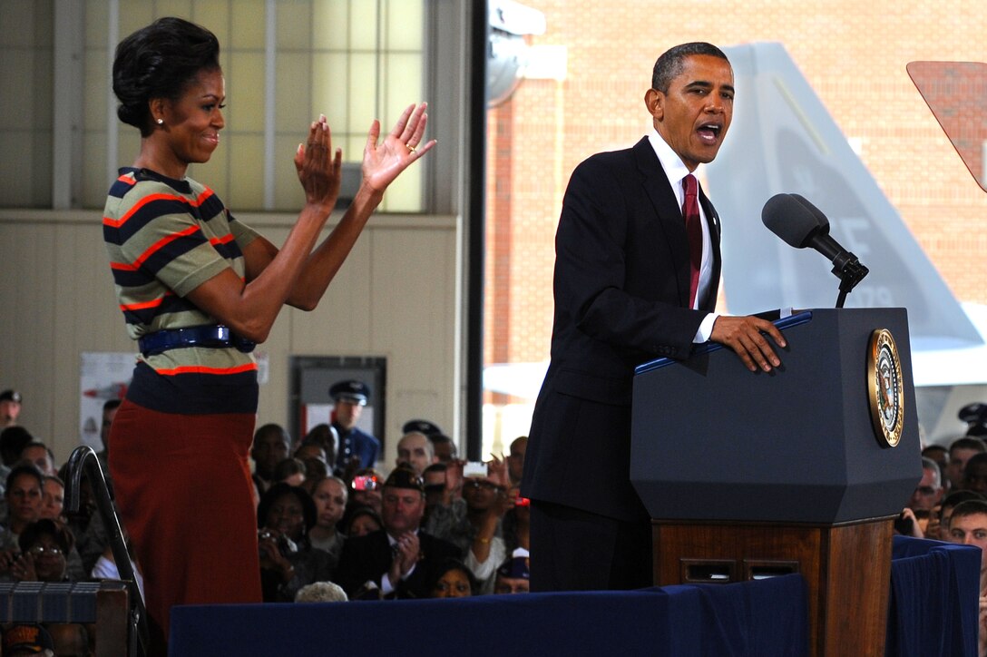First Lady Michelle Obama cheers as President Barack Obama highlights the efforts and accomplishments of the men and women assigned to Joint Base Langley-Eustis during their official visit to Langley Air Force Base, Va., Oct. 19, 2011. The president’s and first lady’s focus was to show support for servicemembers, veterans and military families. (U.S. Air Force photo by Tech. Sgt. Christina M. Styer/Released)    