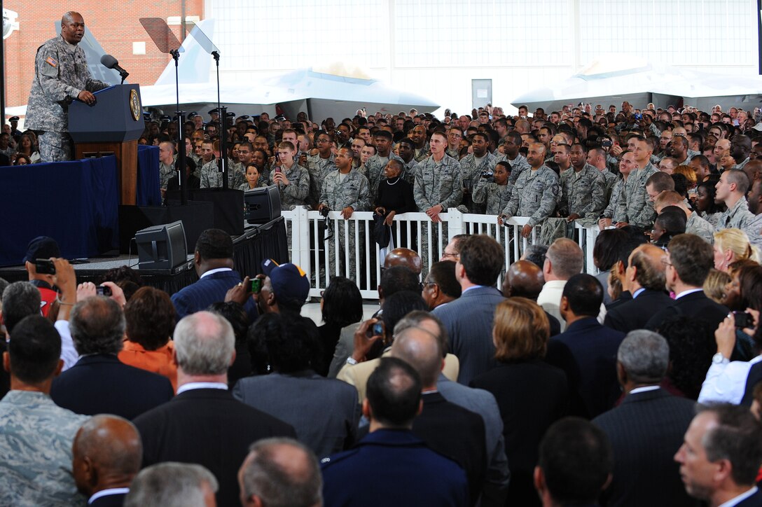 U.S. Army Col. Reggie Austin, 633d Air Base Wing vice commander, prepares the crowd for President Barack Obama’s visit to Langley Air Force Base, Va., Oct. 19, 2011. The president and first lady visited Langley during the American Jobs Act bus tour. (U.S. Air Force photo by Tech. Sgt. Christina M. Styer/Released)  