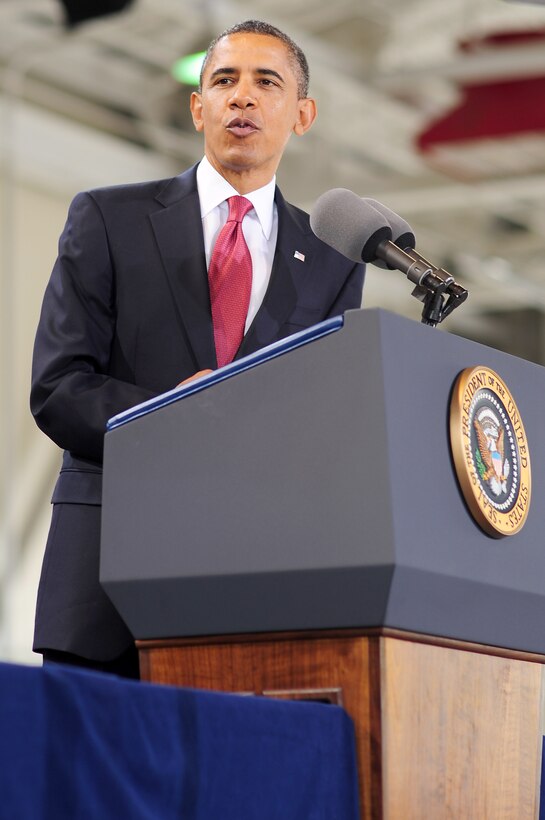 President Barak Obama addresses men and women of Joint Base Langley-Eustis at the 94th Fighter Squadron hangar at Langley Air Force Base, Va., Oct. 19, 2011. The president and the first lady expressed how proud they are of the servicemen and women for the sacrifices they make on a daily basis. (U.S. Air Force photo by Staff Sgt.Antoinette Gibson /Released) 