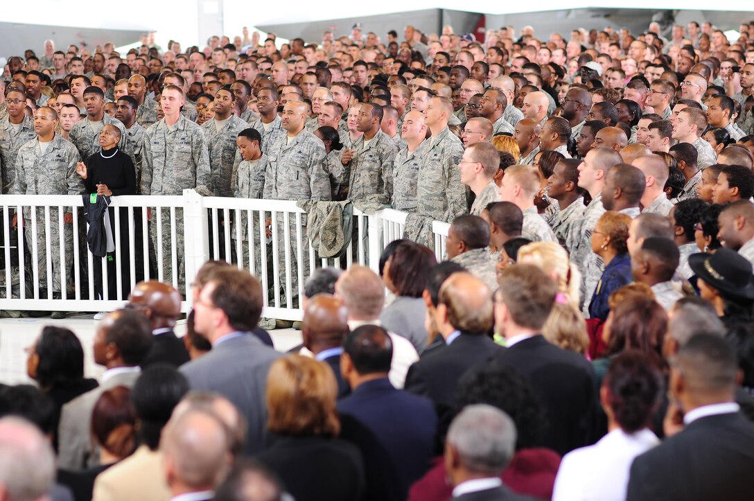 Servicemembers and civilians sing the Army and Air Force songs at Langley Air Force Base, Va., Oct. 19, 2011, during President Obama’s visit. After the visit to Langley, the president planned to visit Fire Station 9 in North Chesterfield, Va., before returning to Washington, DC. (U.S. Air Force photo by Staff Sgt.Antoinette Gibson /Released)