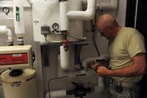MISSILE COMPLEX, N.D. – Master Sgt. Randy Anderson, 741st Missile Squadron facility manager, conducts daily checks of the water systems at the Foxtrot-01 missile alert facility here Sept. 1. Facility managers in the missile field are responsible for the overall safety of the facility and its residents while assigned to the MAFs. (U.S. Air Force photo/Senior Airman Michael J. Veloz)