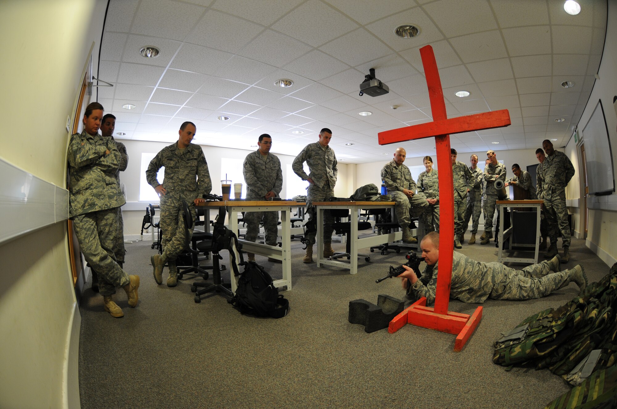 U.S. Air Force Airmen from RAF Lakenheath prepare for rifle qualifications for deployment readiness at RAF Feltwell, England, on April 29, 2011. The 48th Fighter Wing provides all-weather, day or night air superiority and air-to-ground precision combat capability as well as combat search and rescue capabilities. (U.S. Air Force photo by Airman Cory D. Payne/Released)