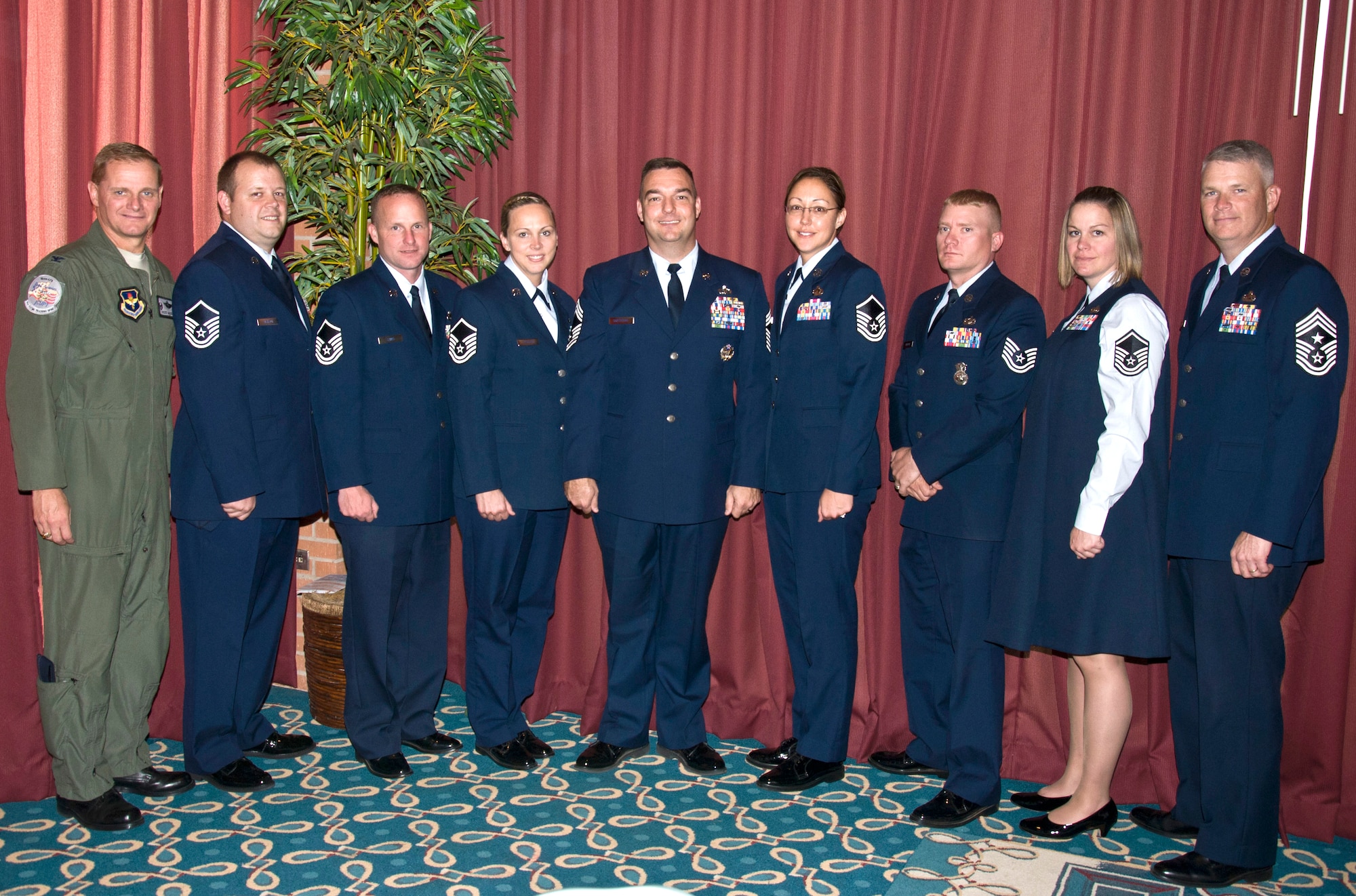 The newest master sergeants at Vance Air Force Base, Okla., join Chief Master Sgt. Frederick Soechting, center, Col. Russ Mack, far left, and Chief Master Sgt. Bruce Aman, far right, after a senior NCO induction luncheon Oct. 13 at the Collocated Club. The new senior NCOs are, from left, Master Sgt. Joseph R. Henson, Master Sgt. Charles Laws, Master Sgt. Charity D. Phillips, Master Sgt. Bobbie White, Tech. Sgt. Richard W. Dodson Jr. and Master Sgt. Carinae D. Samsel. Soechting is the Air Force Enlisted Command and Control Assignment chief at the Air Force Personnel Center, Randolph Air Force Base, Texas. Mack is the 71st Flying Training Wing commander and Aman is the 71st FTW command chief, at Vance Air Force Base. (U.S. Air Force photo/ Terry Wasson)