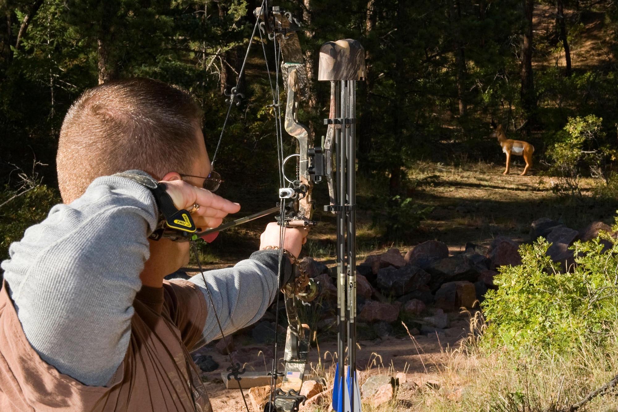 U.S. AIR FORCE ACADEMY, Colo. – Master Sgt. Adam Koehler, 561st Network Operations Squadron, aims his arrow at a 3D target during the 2011 Combined Federal Campaign archery tournament Oct. 14 at the U.S. Air Force Academy archery range. The tournament consisted of 20 target stations to test the archers’ aim and ability. The tournament raised nearly $300 for the CFC campaign. Prizes and a barbeque lunch were provided to participants after the tournament. (U.S. Air Force photo/Craig Denton)