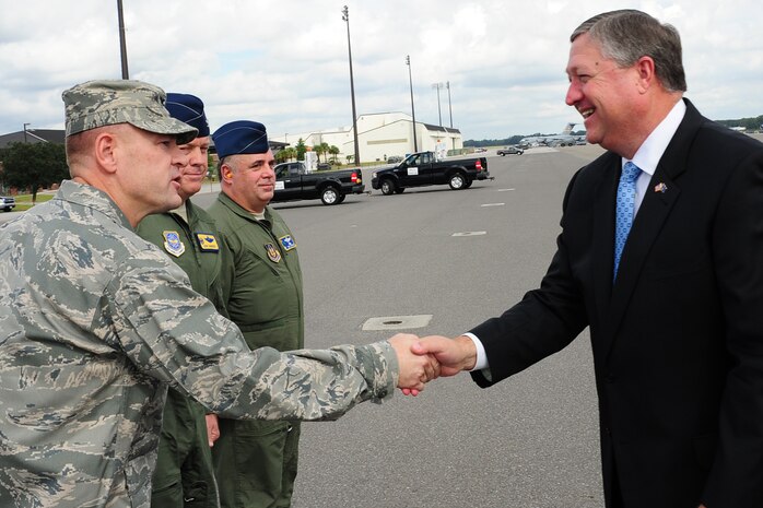 Col. Richard McComb greets Secretary of the Air Force Michael Donley, while 
Col. Erik Hansen and Col. Terry Lawrence stand by. Donley visited Joint Base 
Charleston, S.C., Oct. 18. The Secretary of the Air Force is responsible for the affairs of the Department of the Air Force, including organizing,  training, equipping and providing for the welfare of nearly 370,000 men and  women on active duty, 180,000 members of the Air National Guard and the Air Force Reserve, and 160,000 civilians and their families.  With an annual budget of approximately $119 billion, the secretary ensures the Air Force can meet its current and future operational requirements. McComb is the 628th Air Base Wing Commander, Hansen is the 437th Airlift Wing Commander and Lawrence is the 315th Operations Group Commander. (U.S. Air Force photo/Tech. Sgt. Chrissy Best)
