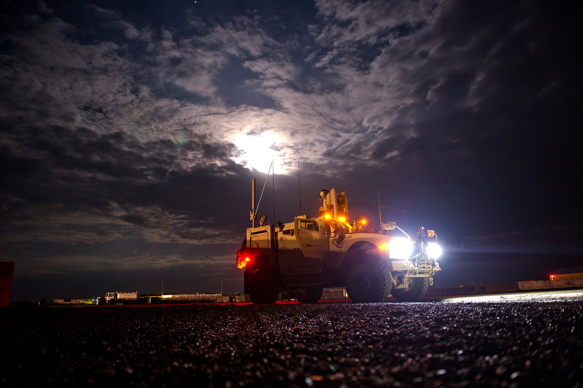 U.S. Air Force Joint Terminal Attack Controller, Senior Airman Cristobal Galindo, 807th Expeditionary Air Support Squadron, and ative of San Bernardino, Calif., prepares the radios in a mine-resistant ambush-protected all-terrain vehicle before a mission on Oct. 12, 2011. JTACs embed with and provide Army ground maneuver units expertise in planning and controlling combat air resources. On this mission, Galindo will provide ground commanders with direct communications to intelligence, surveillance and reconnaissance and combat close air support aircraft. (U.S. Air Force Photo/Master Sgt. Jeffrey Allen)
