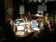 Capt. Carmen Thompson, 911th Air Refueling Squadron, and Maj. Brad Davis, 77th Air Refueling Squadron, talk with G105.1 FM's Bob and the Showgram on Oct. 18, 2011. The two pilots will be flying the popular morning radio hosts on Oct. 19, 2011, along with the Durham Bulls organization. (USAF photo by Maj. Erin Karl, 916ARW/PA)