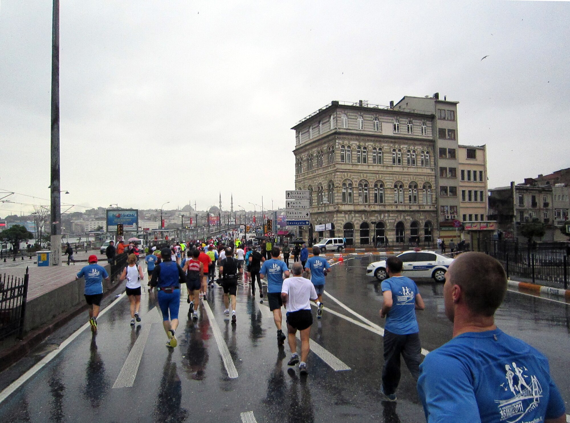 Members of Team Incirlik and other race participants run down the streets of Istanbul during the Intercontinental Istanbul Eurasia Marathon and associated events Oct. 16, 2011. Approximately 30 people from the base traveled nearly 600 miles to participate in the events, which included a marathon, 15K, 8K and fun run. Race participants traversed the Boshporus Bridge, which connects Asia to Europe, making the race a unique experience to run from one continent to another.  (U.S. Air Force photo by Staff Sgt. Kali L. Gradishar/Released)