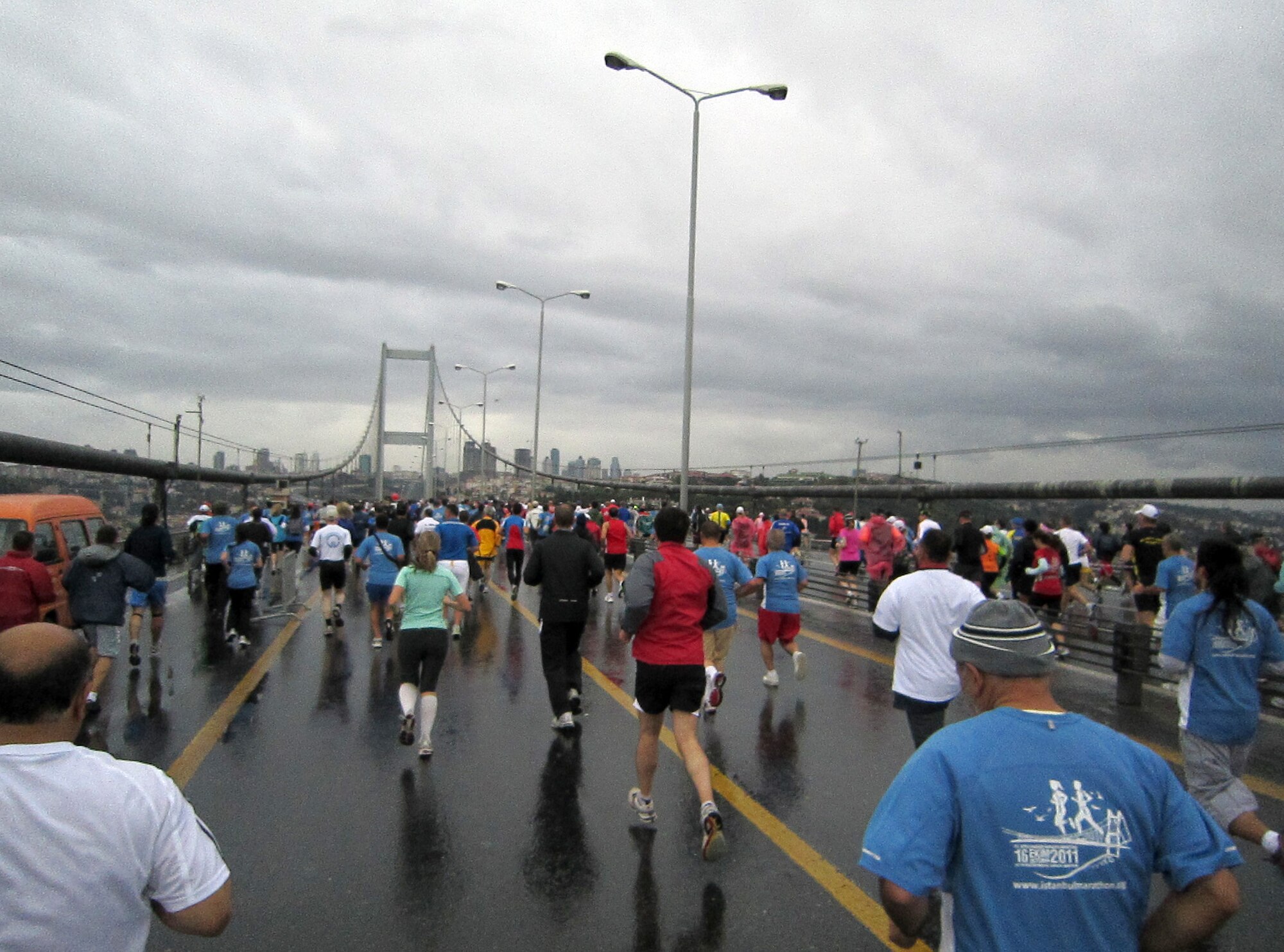 Members of Team Incirlik and other race participants run over Bosphorus Bridge, which connects Asia to Europe, during the Intercontinental Istanbul Eurasia Marathon and associated events Oct. 16, 2011, in Istanbul. Approximately 30 people from the base traveled nearly 600 miles to participate in the events, which included a marathon, 15K, 8K and fun run. (U.S. Air Force photo by Staff Sgt. Kali L. Gradishar/Released)