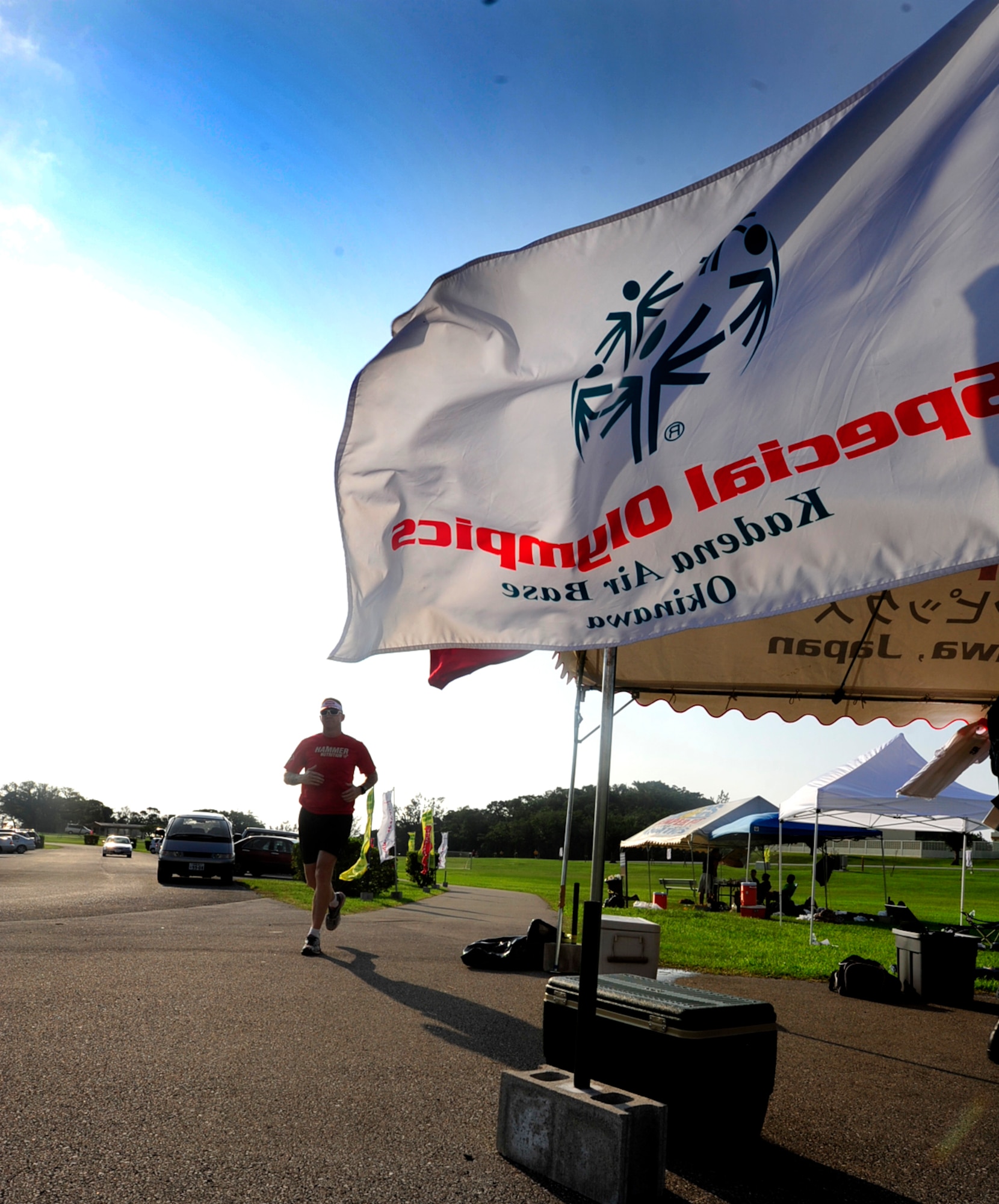U.S. Marine Corps Staff Sgt. Jason C. Wooden, Marine Air Control Squadron 4, information security technician, Futenma, participates in the Kadena Special Olympics jog-a-thon at Marek park, Kadena Air Base, Japan Oct. 19. This event is a fundraiser for the annual KSO held Nov 5. (U.S. Air Force photo/Tech. Sgt. Lakisha A. Croley/released)