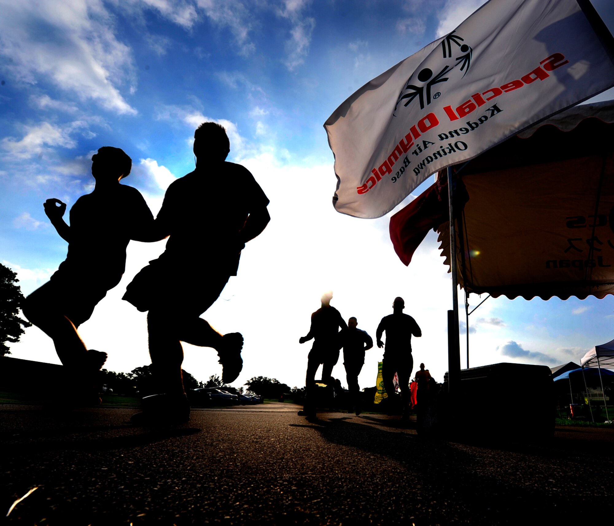 U.S. Marine Corpsmen participate in the Kadena Special Olympics jog-a-thon at Marek park, Kadena Air Base, Japan Oct. 19. This jog-a-thon is a fundraiser in support of the 12th annual Kadena Special Olympics Nov 5. (U.S. Air Force photo/Tech. Sgt. Lakisha A. Croley/released)