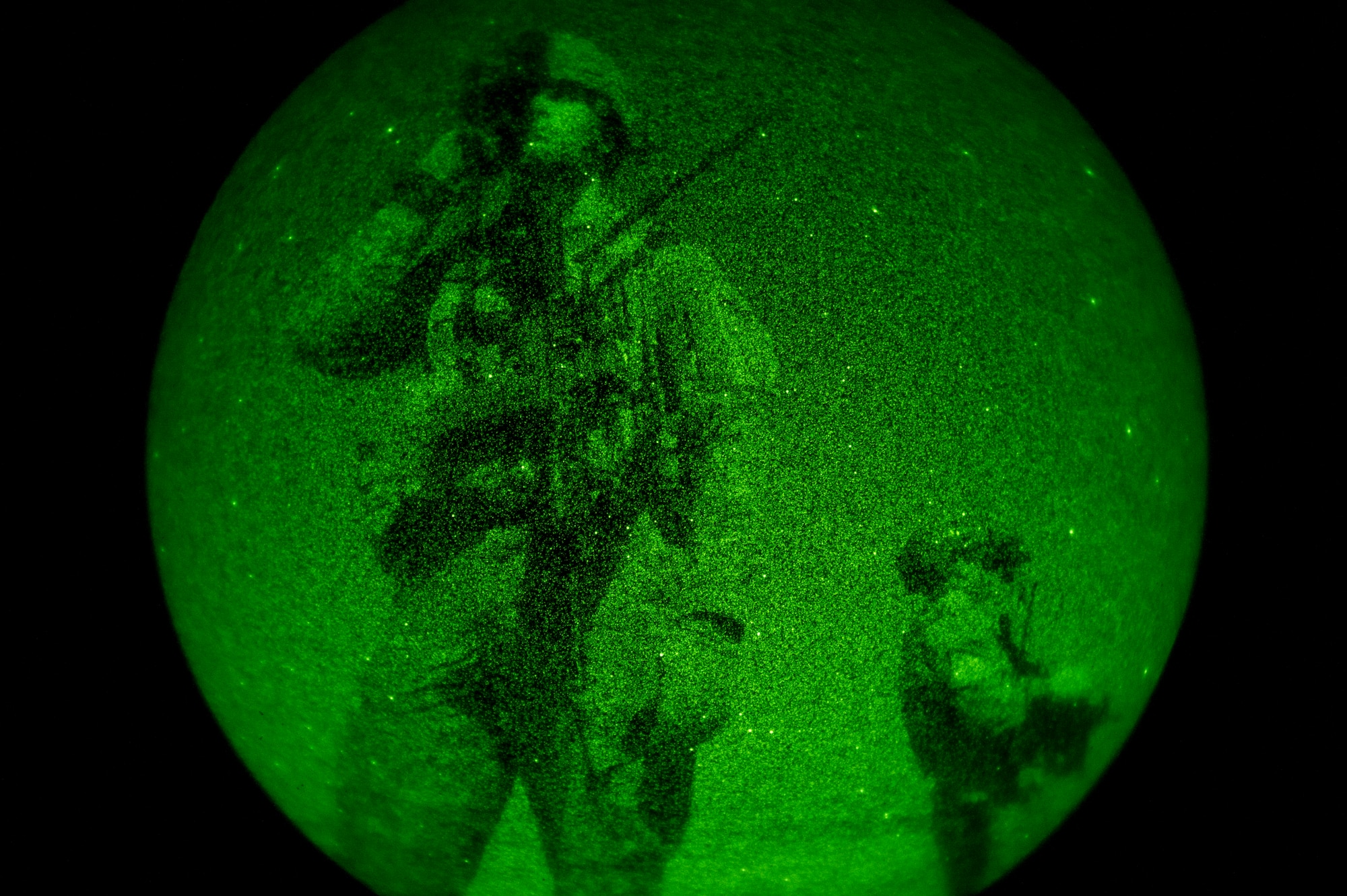 Left, U.S. Army 1st Lt. Andrew Adams, 1st platoon leader of Bravo Troop, 238 Cavalry, 504th Battlefield Surveillance Brigade, and U.S. Air Force Staff Sgt. Joshua Dickey, Joint Terminal Attack Controller, scan the battlefield in the Spin Boldak Province, Afghanistan, Oct. 9, 2011.  Later that night, the platoon took direct enemy fire, and suffered zero casualties. (U.S. Air Force photo by Staff Sgt. David Salanitri)
