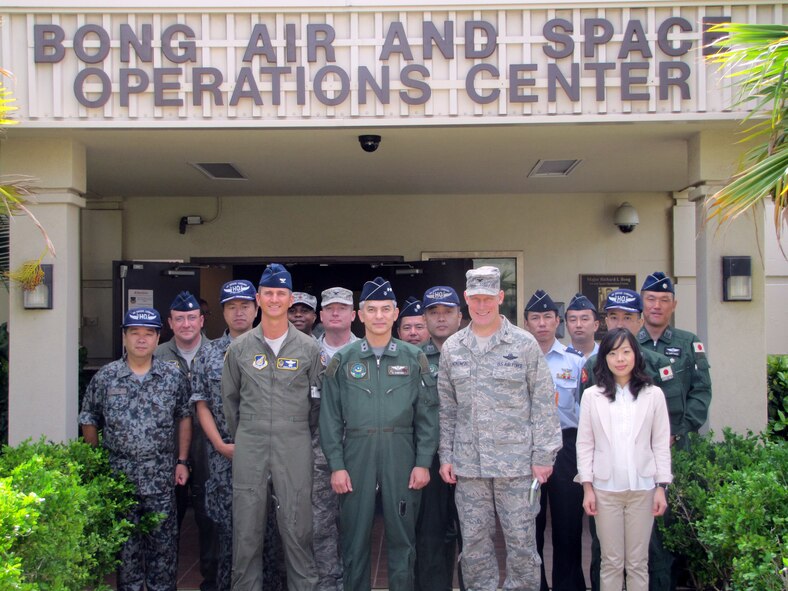 JOINT BASE PEARL HARBOR-HICKAM, Hawaii – 13th Air Force commemorates Maj. Gen. Hiroaki Maehara's visit with a picture in front of the 613th Air and Space Operations Center. Lt. Gen. Ted Kresge,  Commander, 13th  Air Force met with Maj. Gen. Maehara,  Director of Plans and Operations, Koku Jieitai (Japan Air Self Defense Force), Oct. 17, 2011.  This high-level meeting was one, in a series between 13th Air Force and Koku Jieitai leadership leading up to exercise Keen Edge in January 2012.  Exercises and engagements such as this serve to strengthen the alliance between the United States and Japan; a cornerstone of peace and stability in the Asia-Pacific region. Exercise Keen Edge is a biennial Chairman Joint Chiefs of Staff/bilateral Command Post Exercise that prepares U.S. Pacific Command sub-unified commands, service components, and Japan Self-Defense Forces for the defense of Japan.  