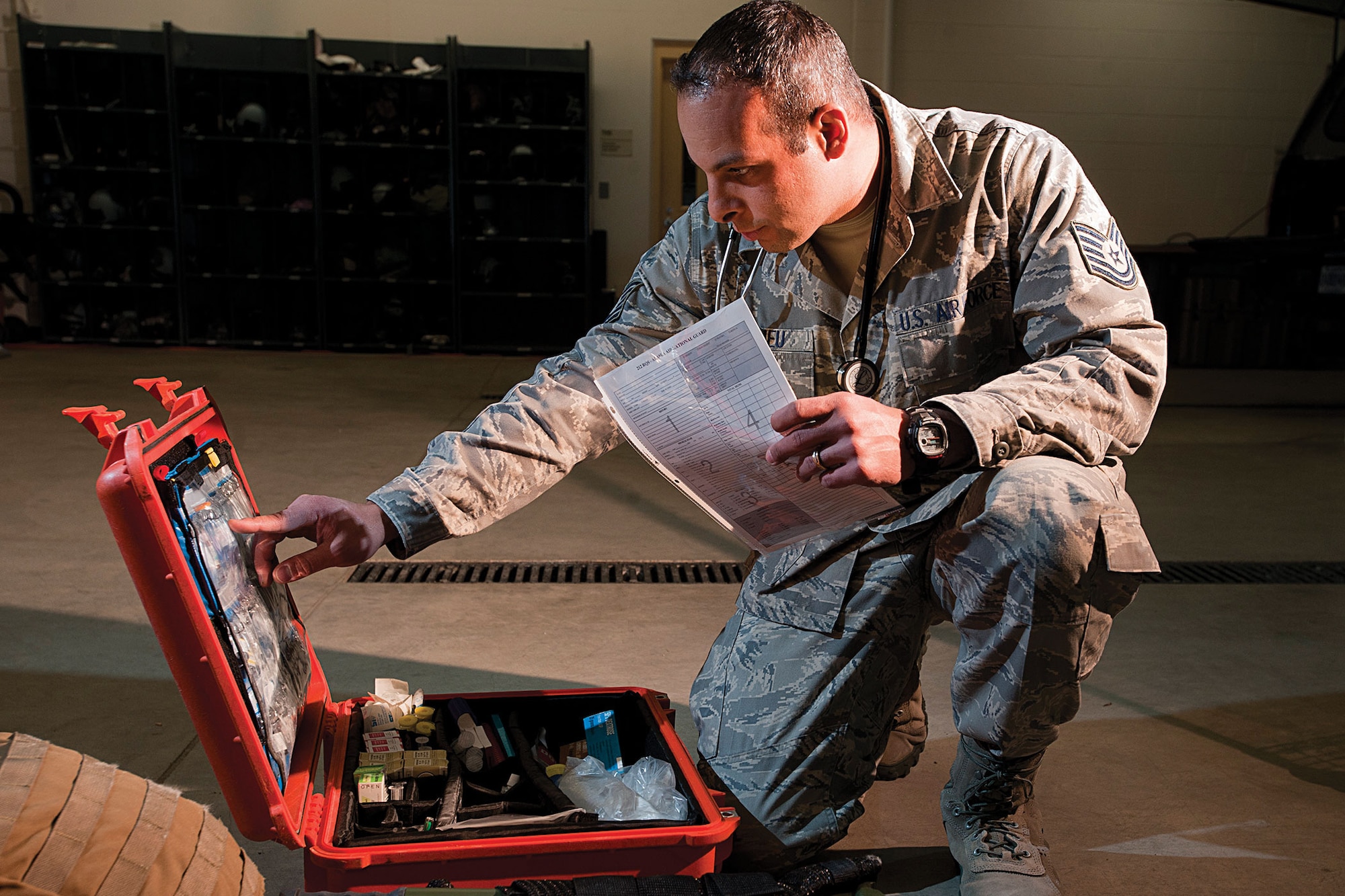 Tech. Sgt. Darrell Mathieu, 212th Rescue Squadron independent duty medical technician, checks the inventory of medical equipment on Joint Base Elmendorf-Richardson Oct. 12. (U.S. Air Force photo/Staff Sgt. Zachary Wolf)