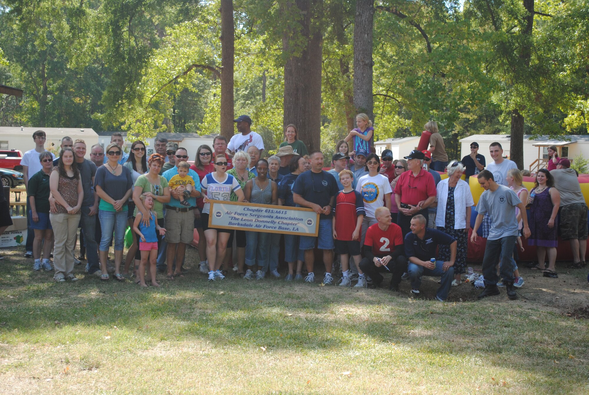 Air Force Sergeants Association members pose for a photo after an AFSA picnic at Cullen Park on Barksdale Air Force Base, La., Oct. 8. Approximately 80 families came to enjoy the festivities. AFSA hosts a variety of activities for members and their families. (Courtesy Photo)(RELEASED) 
