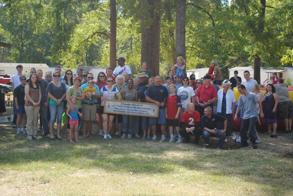 Air Force Sergeants Association members pose for a photo after an AFSA picnic at Cullen Park on Barksdale Air Force Base, La., Oct. 8. Approximately 80 families came to enjoy the festivities. AFSA hosts a variety of activities for members and their families. (Courtesy Photo)(RELEASED) 