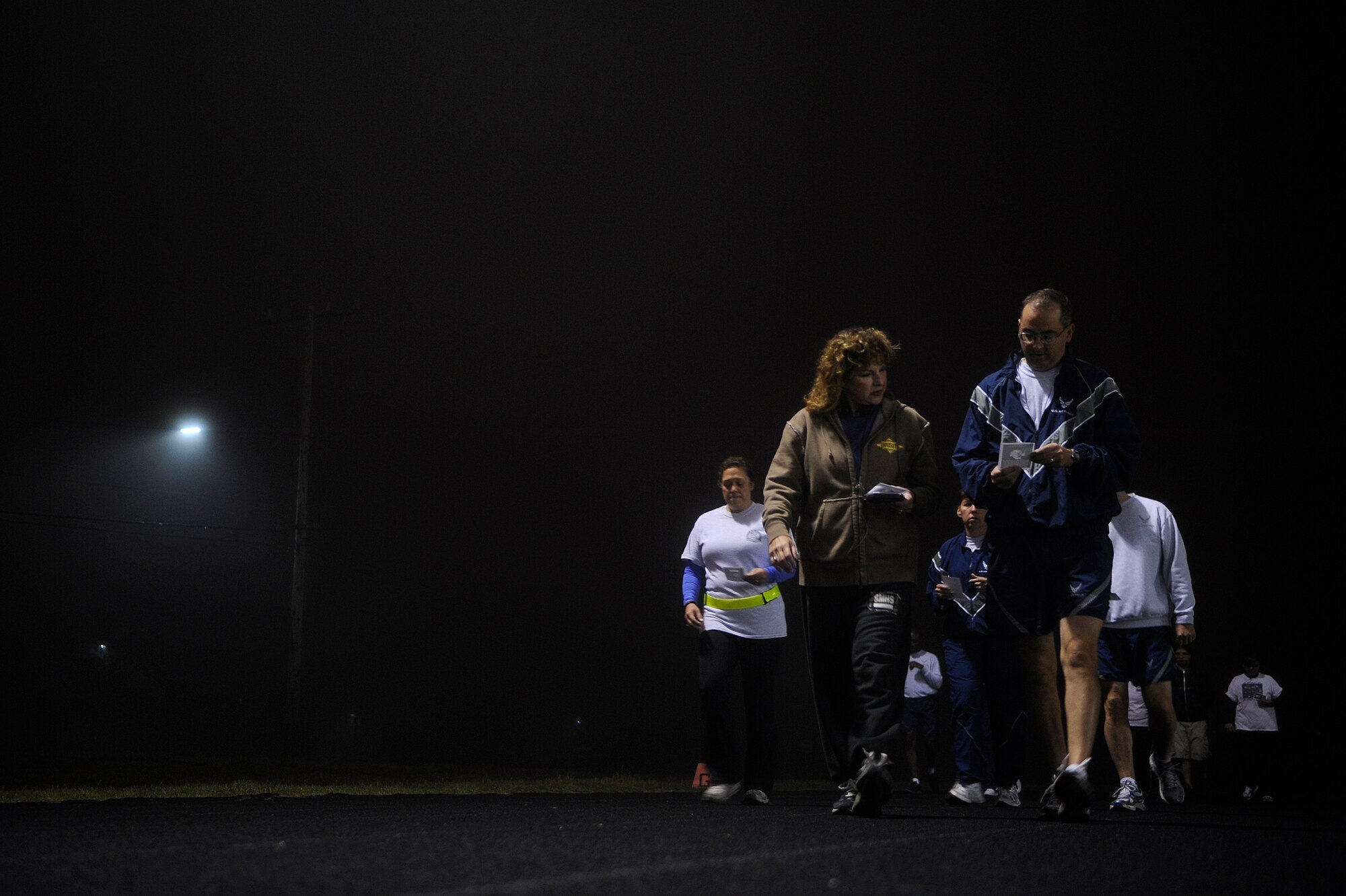 VANDENBERG AIR FORCE BASE, Calif. -- Col. Keith Balts, 30th Space Wing vice commander, walks with Gold Star Moms and Team V members during A Run to Remember event at the Vandenberg track, here Thursday, Oct. 20, 2011. The purpose of A Run to Remember is to honor all service members who lost their lives in support of Operation Iraqi Freedom, Operation Enduring Freedom and Operation New Dawn. (U.S. Air Force photo/Staff Sgt. Andrew Satran) 

 