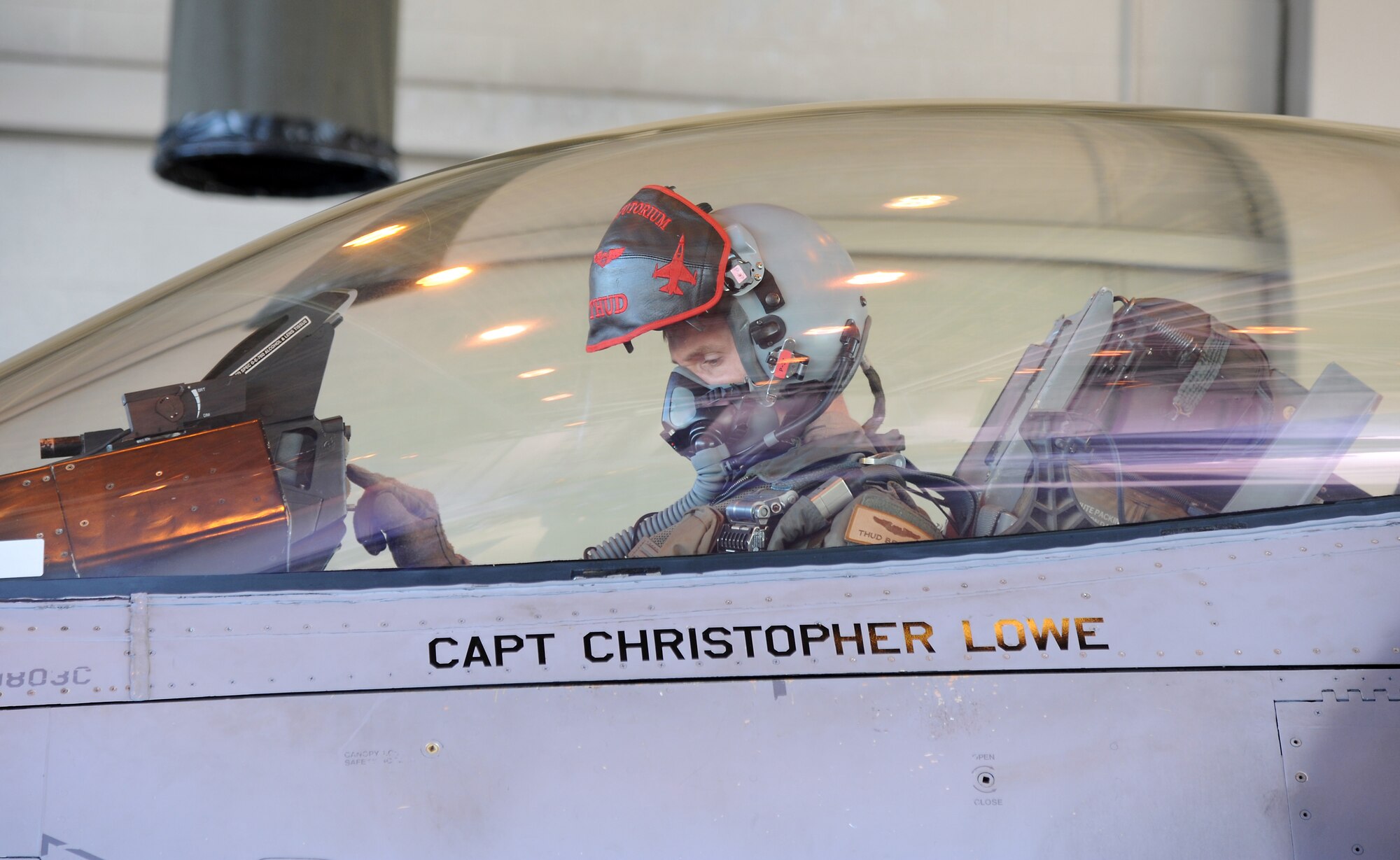 U.S. Air Force Captain Chris Behrens conducts preflight checks in an U.S. Air Force F-16 Fighting Falcon Oct. 12, 2011, Eielson Air Force Base, Alaska. Before every flight, pilots ensure their jets are functioning properly and will be at their peak performance. Behrens is an F-16 Fighting Falcon pilot assigned to the 13th Fighter Squadron, Misawa Air Base, Japan. (U.S. Air Force photo by Senior Airman Willard E. Grande II/Released)