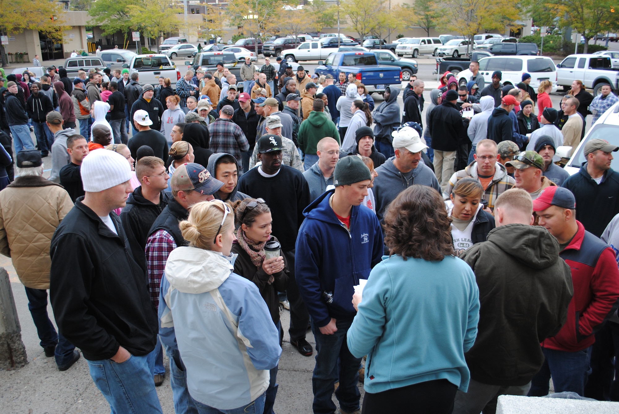Hundreds of volunteers showed up at the Post Office parking lot the morning of Oct. 14 waiting to be assigned to various jobs around the community.  More than 250 volunteers; made up of members from Malmstrom Air Force Base, the Montana Air National Guard and federal employees; participated in the Day of Caring as part of the Combined Federal Campaign.  (U.S. Air Force photo/Airman Cortney Paxton)
