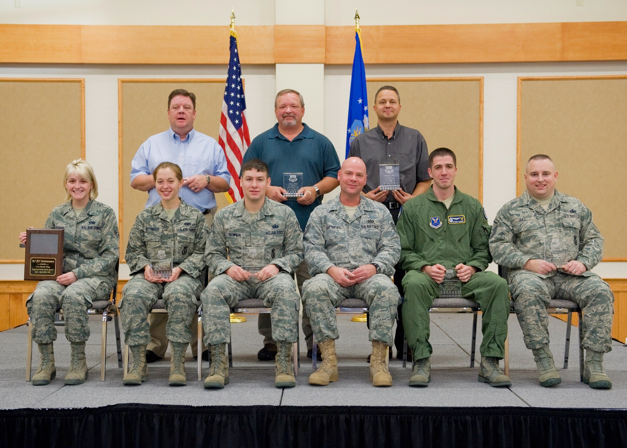 The following individuals were selected as the quarterly award winners for July 1-September 30 and were honored at a breakfast held at the Grizzly Bend October 18. Back row:  Civilian Category I Supervisor, Kenneth Sanders, 341st Civil Engineer Squadron; Civilian Category I, John Dresel, 341st Medical Group; Civilian Category II, Benjamin Rice, 341st Operations Support Squadron. Front row: Professional Team of the Quarter, RS/RV Maintenance Representative Airman 1st Class Morgan Riddleberger, 341st Missile Maintenance Squadron; Airman of the Quarter, Airman 1st Class Julie Bittinger, 341st Missile Security Forces Squadron; Honor Guard member of the Quarter, Staff Sgt. Jamie Thompson, 341st MSFS; Non-commissioned officer of the Quarter, Tech. Sgt. Mark Matthews, 341st CES; Company Grade Officer of the Quarter, Capt. Michael Nerenberg, 341st OSS; Senior non-commissioned officer of the Quarter, Master Sgt. Steven Doll, 341st Security Forces Group. (U.S. Air Force Photo / Beau Wade)