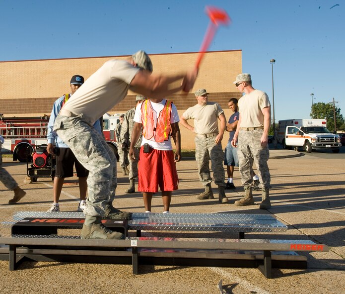 A competitor completes the Keiser Sled portion of the 2nd Bomb Wing Fire Muster on Barksdale Air Force Base, La., Oct. 14. This was the first fire-fighter related competition open to all Barksdale Airmen. (U.S. Air Force photo/Senior Airman Chad Warren)(RELEASED)