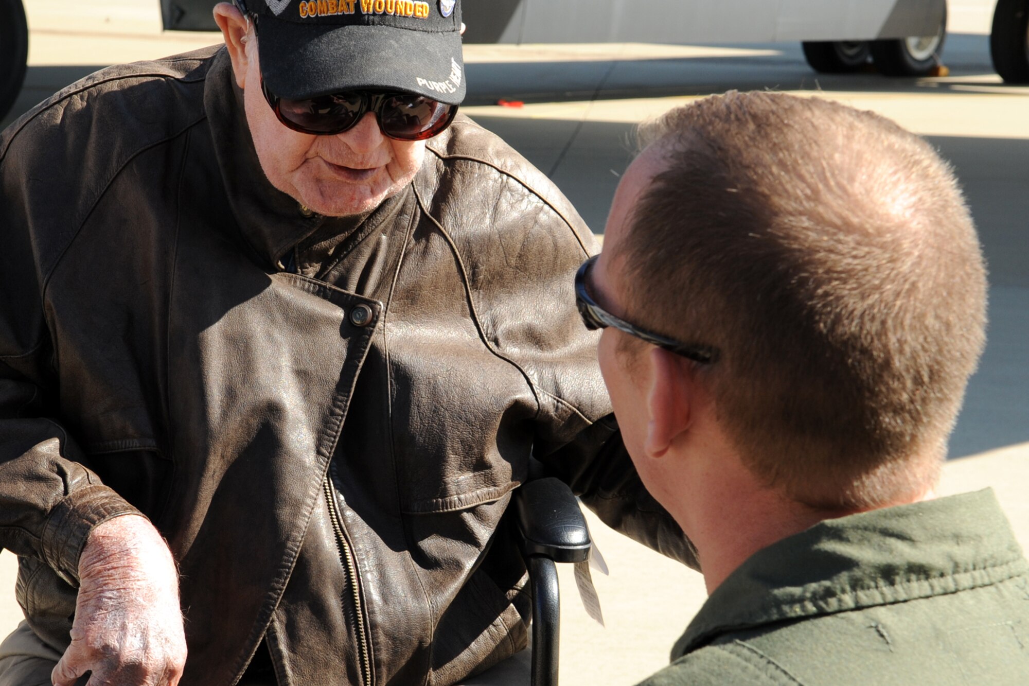 A member of the 98th Bomb Group Veterans Association talks with a B-52 aircrew member at Barksdale Air Force Base, La., Oct. 19, 2011. The 98th held their annual reunion at Barksdale and was given a tour of a 307th Bomb Wing B-52 Stratofortress. (U.S. Air Force photo by Betty Stephens/Released)