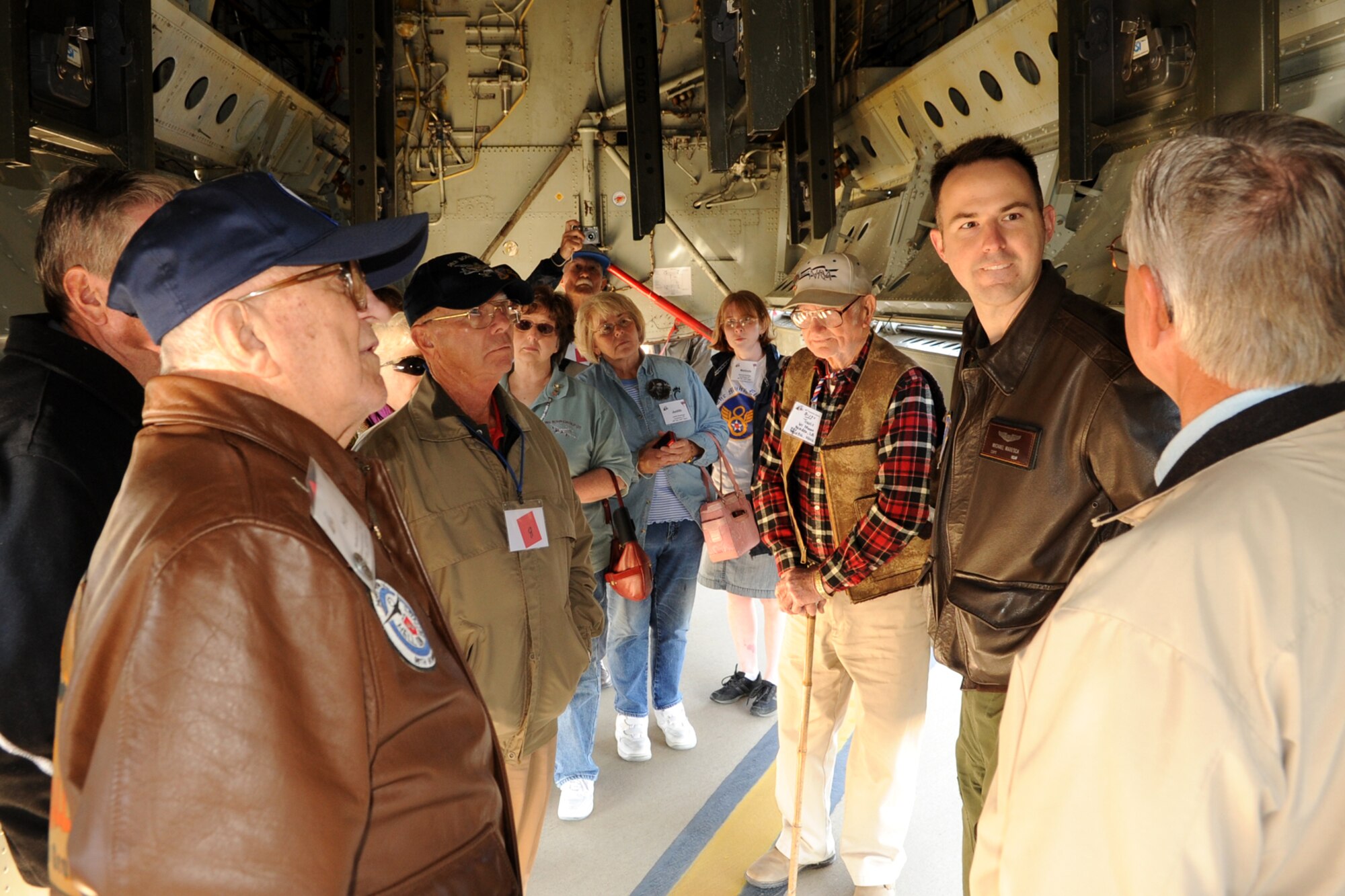 A member of the 98th Bomb Group Veterans Association asks a question about the B-52 aircraft to U.S. Air Force Capt. Michael Maresca, 20th Bomb Squadron aircrew member, Barksdale Air Force Base, La., Oct. 19, 2011. The 98th held their annual reunion at Barksdale and was given a flight line tour of a 307th Bomb Wing B-52 Stratofortress. (U.S. Air Force photo by Master Sgt. Greg Steele/Released)