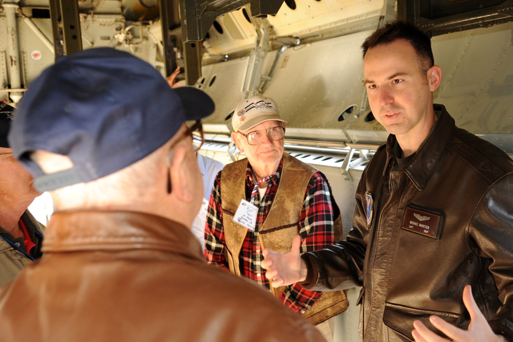 U.S. Air Force Capt. Michael Maresca, 20th Bomb Squadron aircrew member, talks about the capabilities of the B-52 with members of the 98th Bomb Group Veterans Association, Barksdale Air Force Base, La., Oct. 19, 2011. The 98th held their annual reunion at Barksdale and were given a flight line tour of a 307th Bomb Wing B-52 Stratofortress. (U.S. Air Force photo by Master Sgt. Greg Steele/Released)