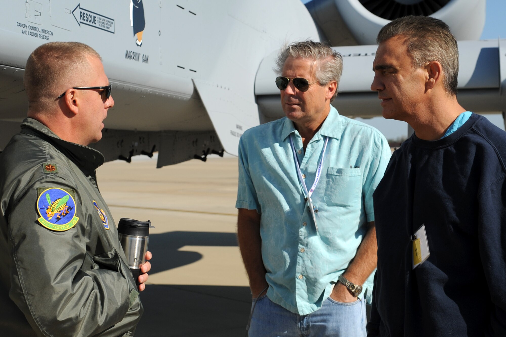 U.S. Air Force Maj. Maurice Kent, 47th Fighter Squadron pilot, answers questions about the capabilities of the A-10 Thunderbolt II aircraft from members of the 98th Bomb Group Veterans Association, Barksdale Air Force Base, La., Oct. 19, 2011. The 98th held their annual reunion at Barksdale and were given a tour of a 917th Fighter Group A-10. (U.S. Air Force photo by Master Sgt. Greg Steele/Released)