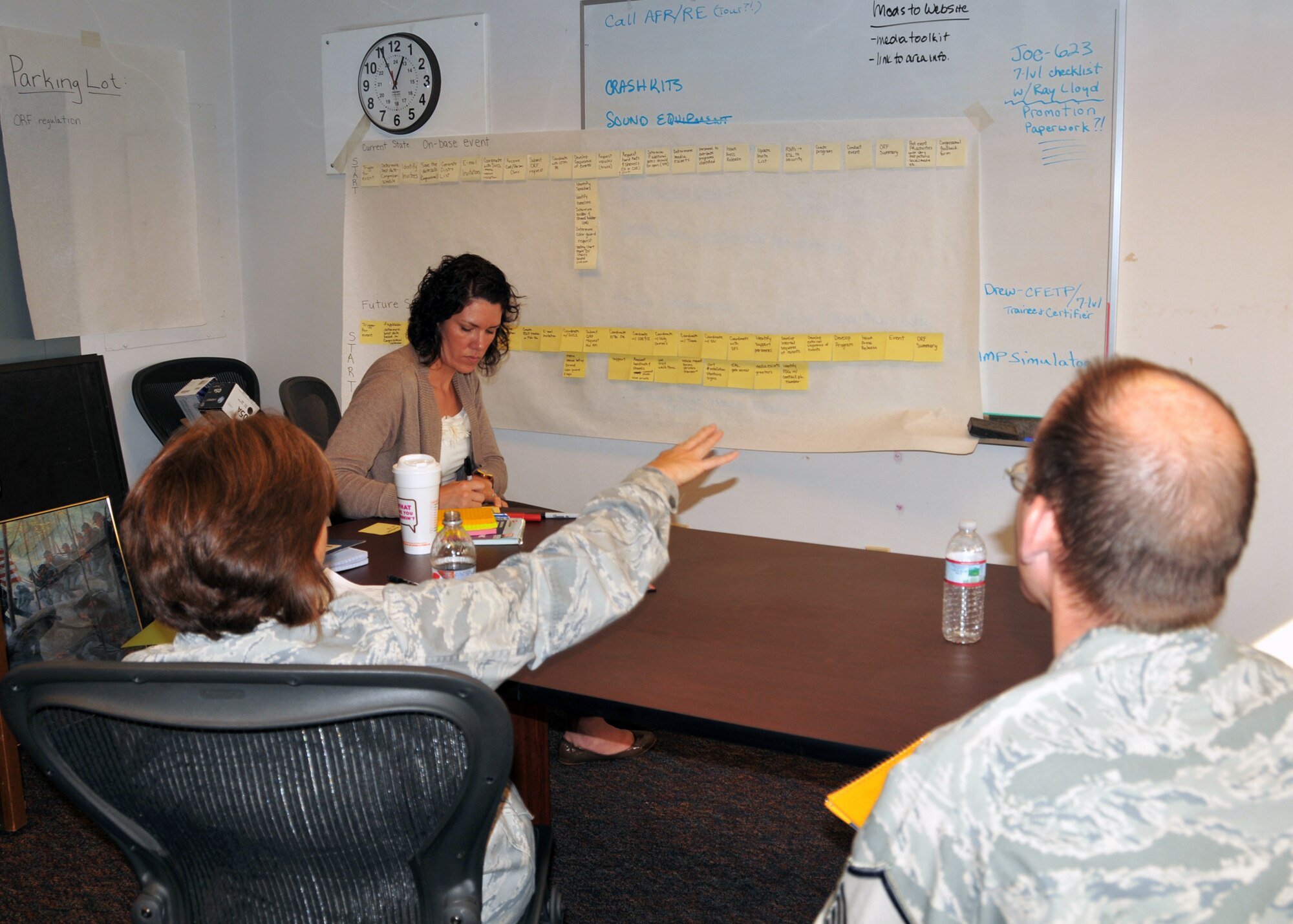 Members of the 914th Airlift Wing public affairs office participate in an Air Force Smart Operations for the 21st Century (AFSO21) process improvement exercise October 18, 2011, Niagara Falls Air Reserve Station, NY. AFSO21 principles are used throughout the Air Force to look for ways to improve processes and create efficiencies in team operations. (U.S. Air Force photo by Staff Sgt. Joseph McKee)